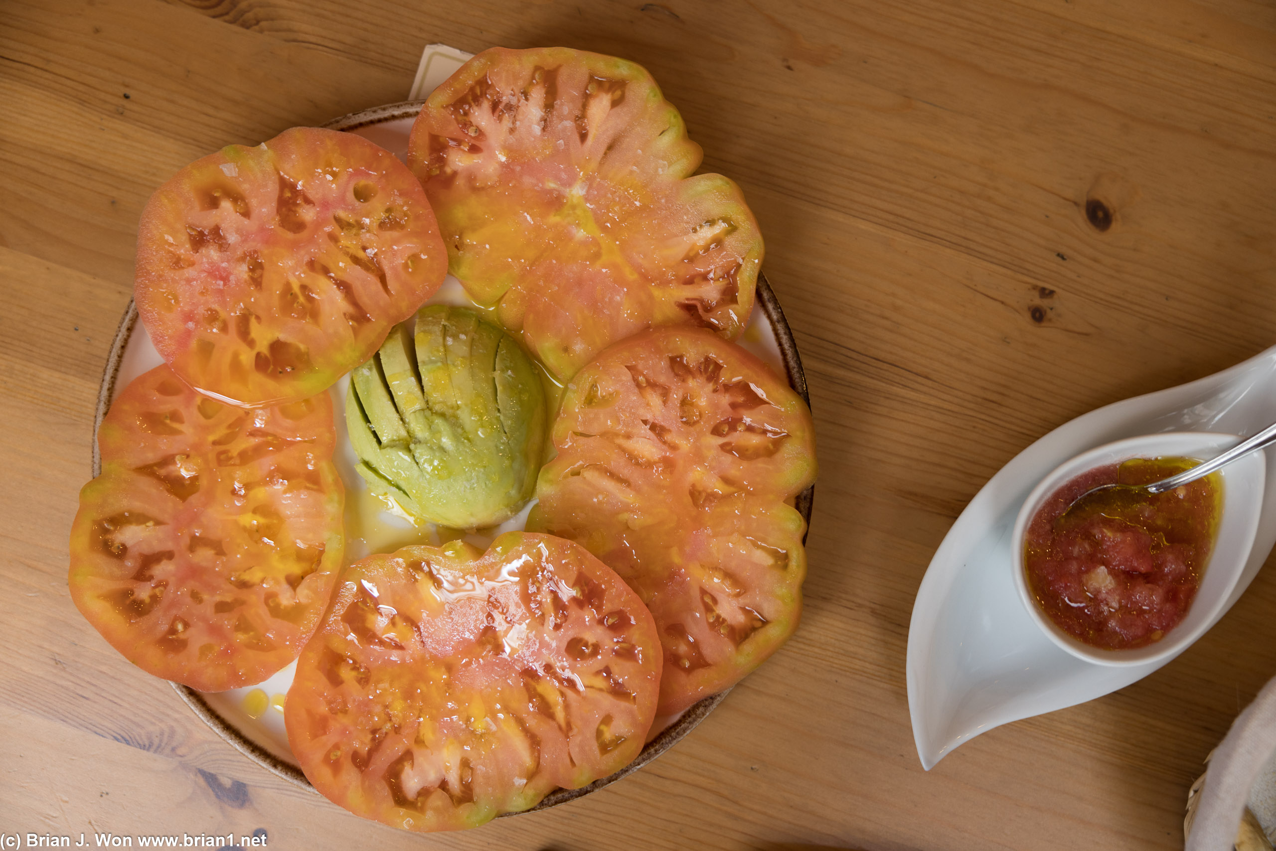 Delicious tomato and avocado plate.