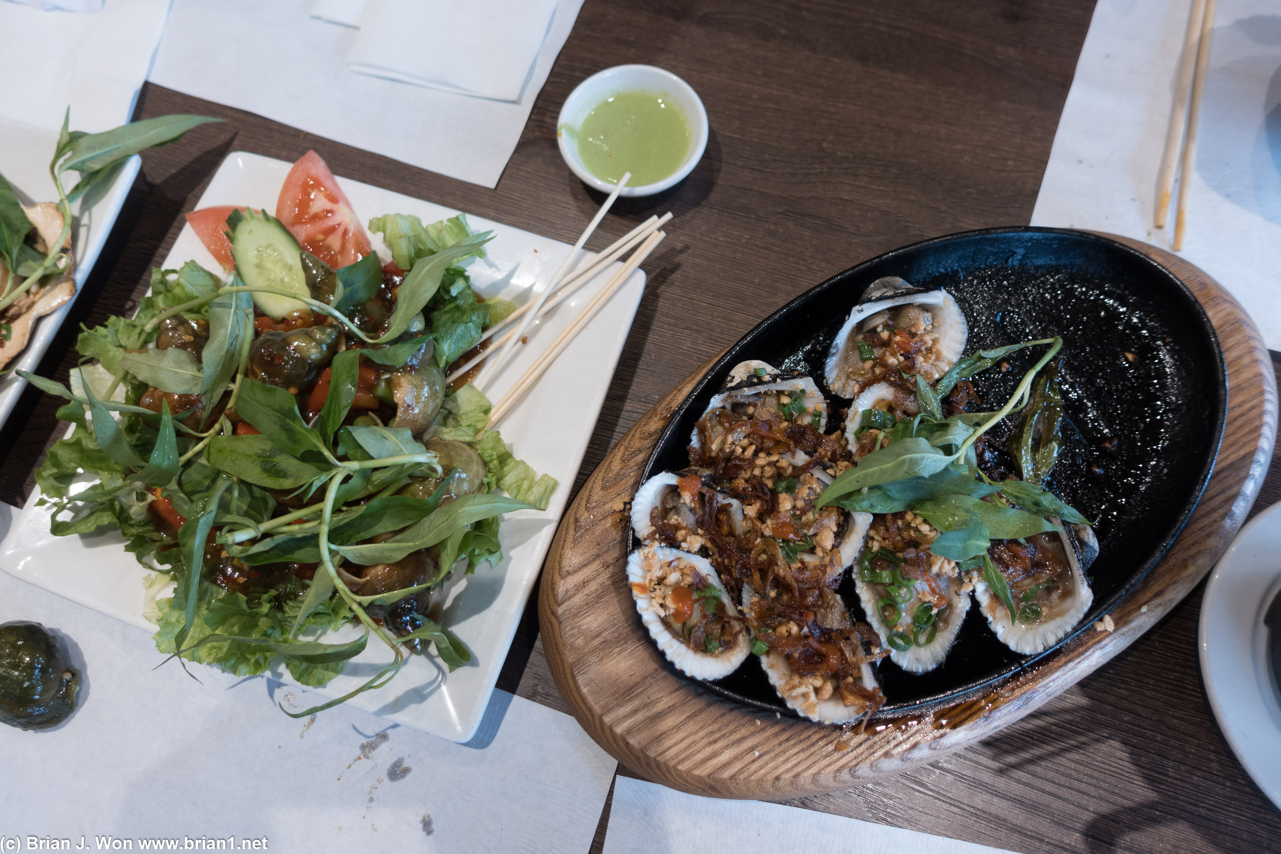 Escargot next to clams.