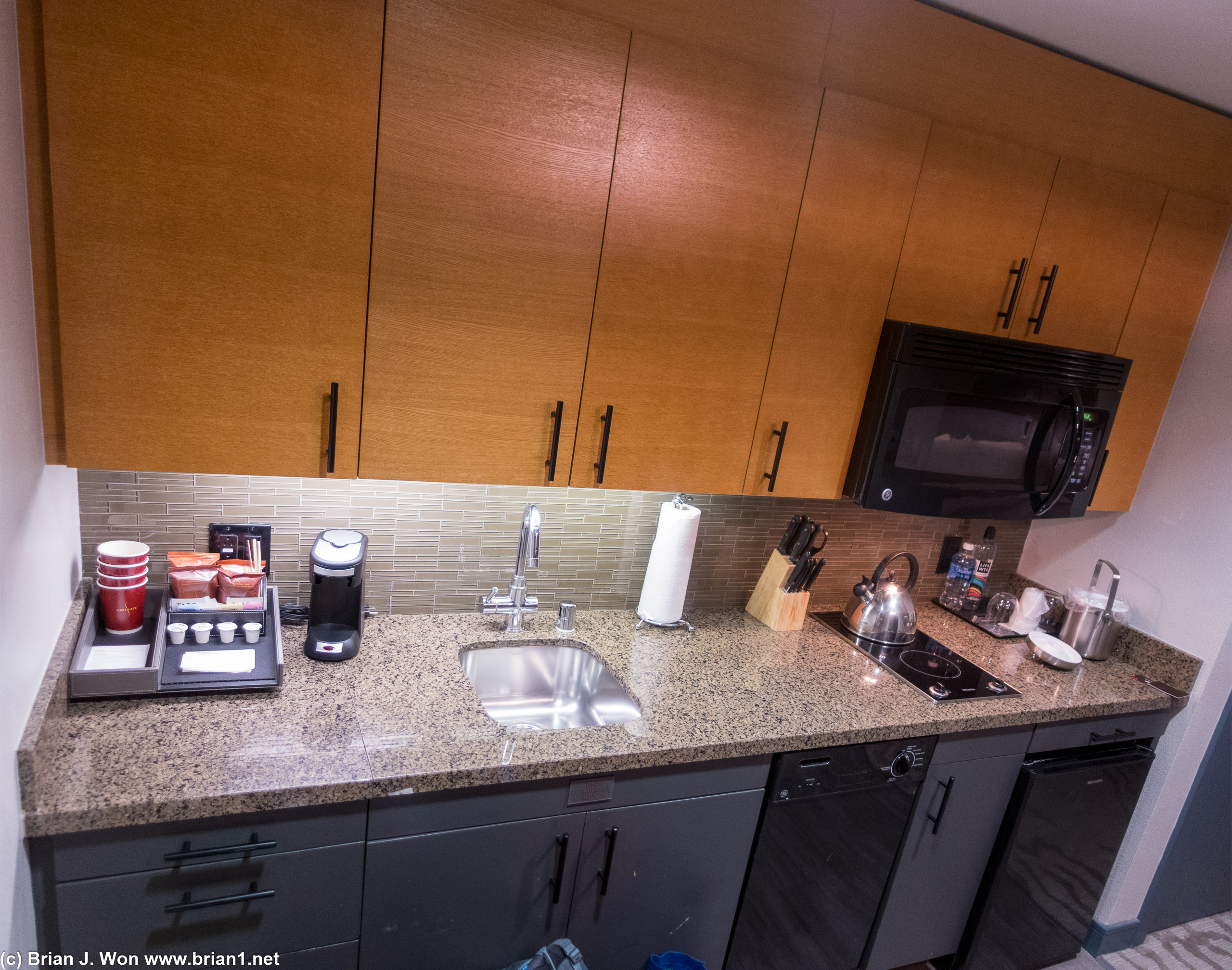 Kitchens in studio and 1 bedroom units lack a full-sized fridge... and no oven. Boo.