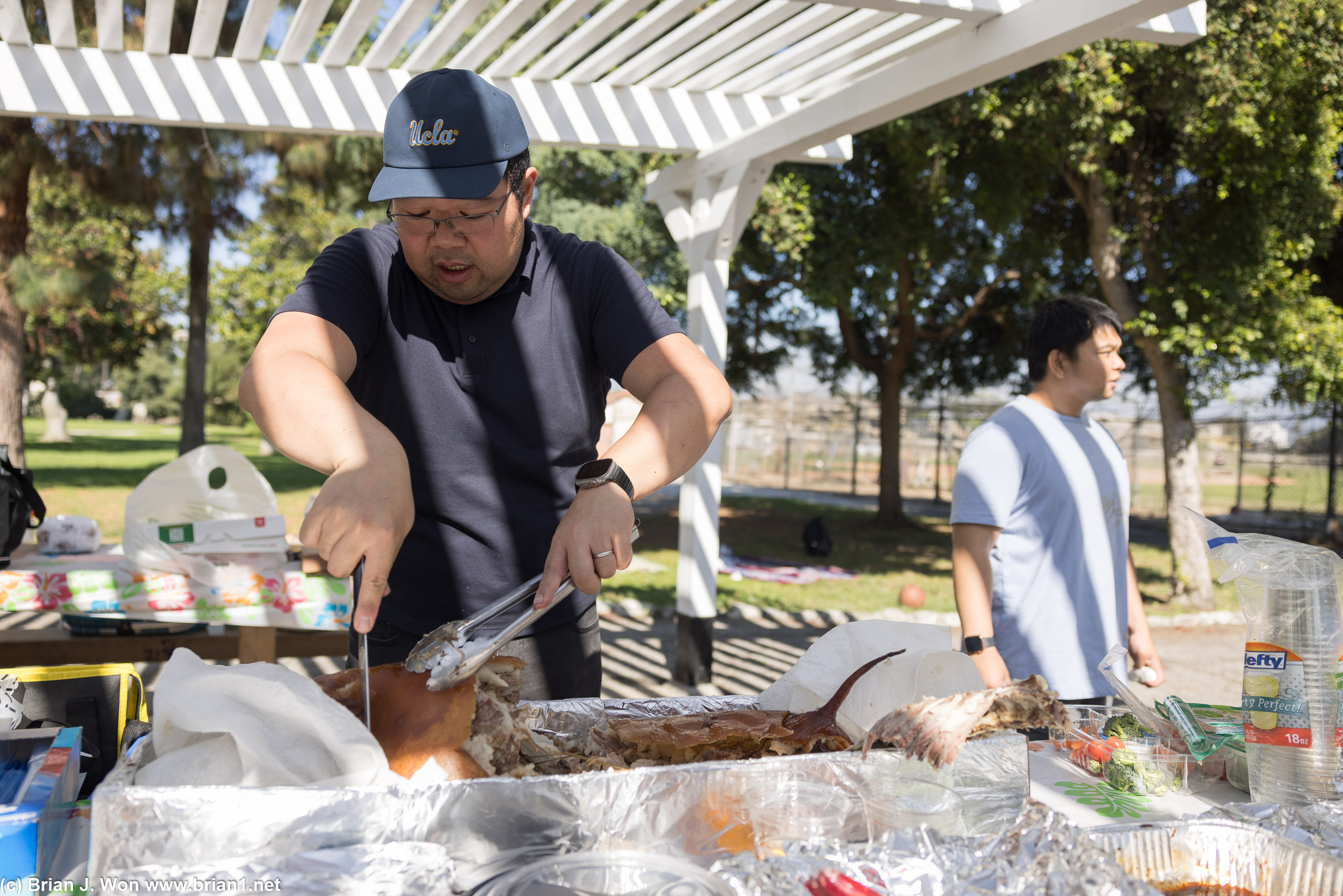 Joe carving the pig.