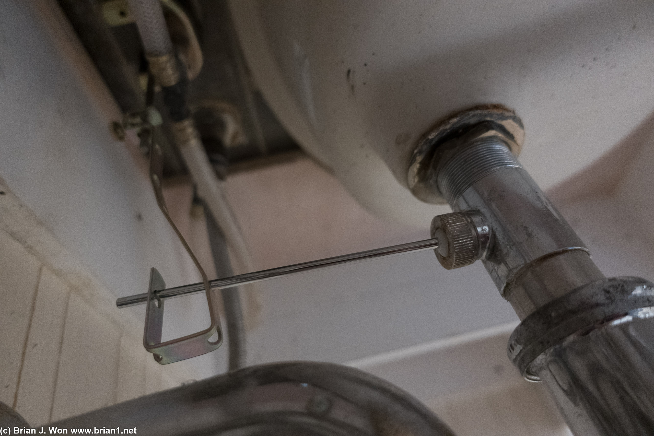 Janky plumbing. Had to fix both sink stoppers.