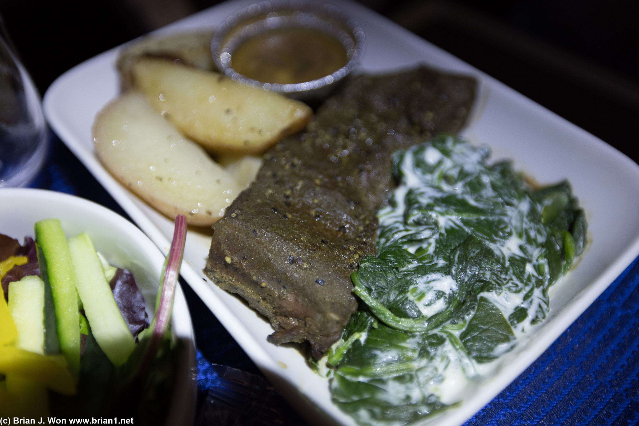 Close-up of beef and spinach.