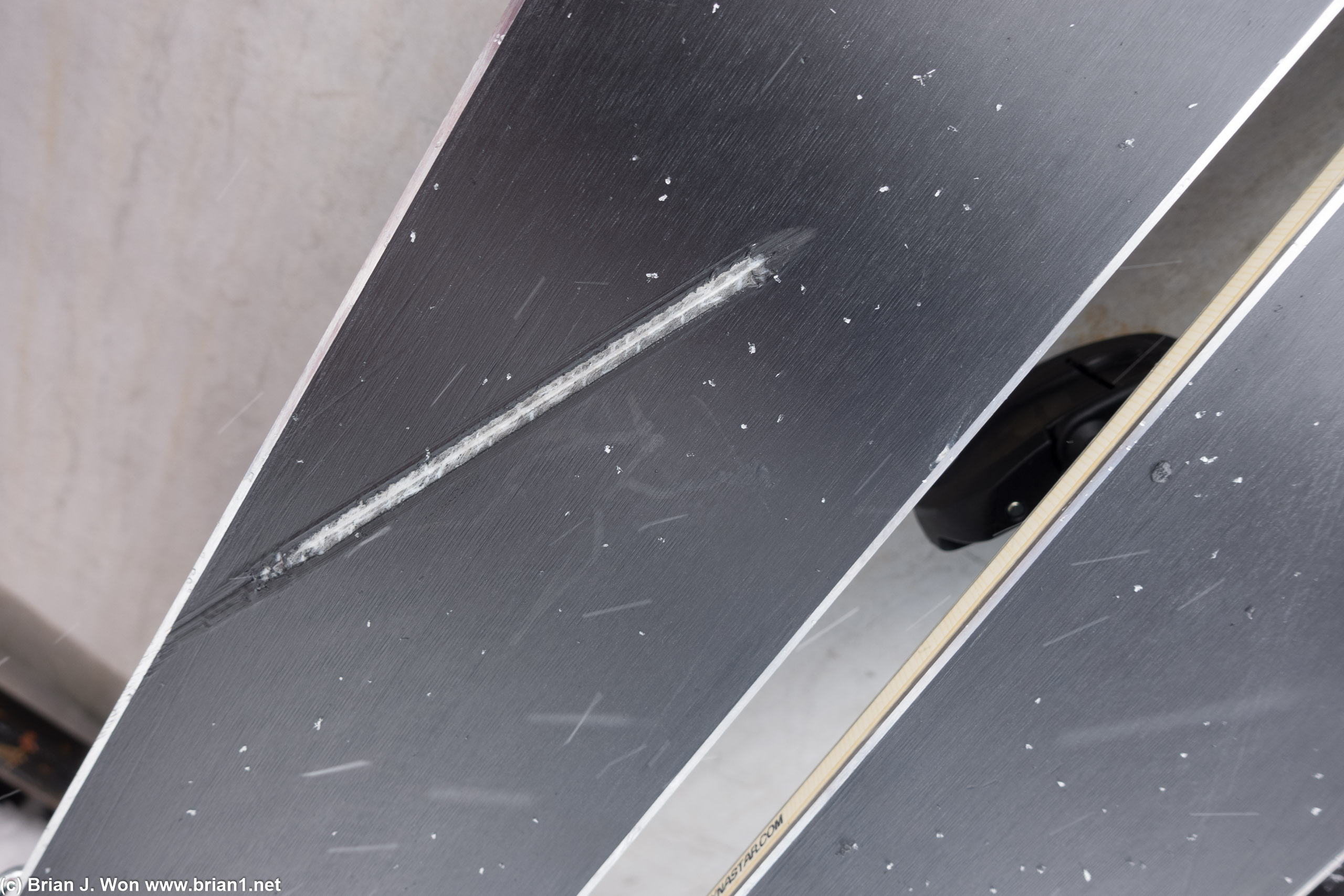 Chris' brand new skis took a core shot. Ouch. :(