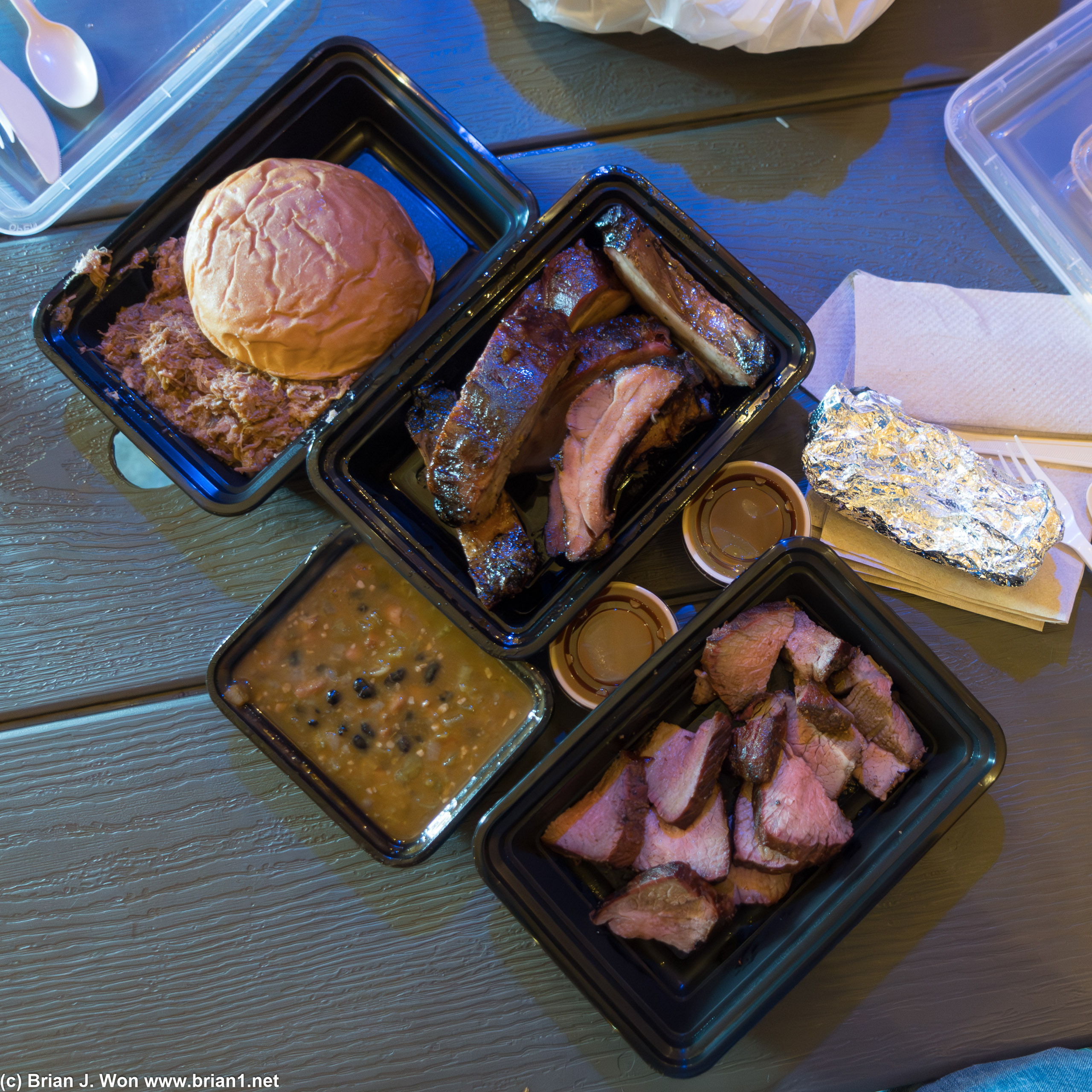 Pulled pork burger, pork ribs, tri-tip, and chili at Copper Top BBQ.