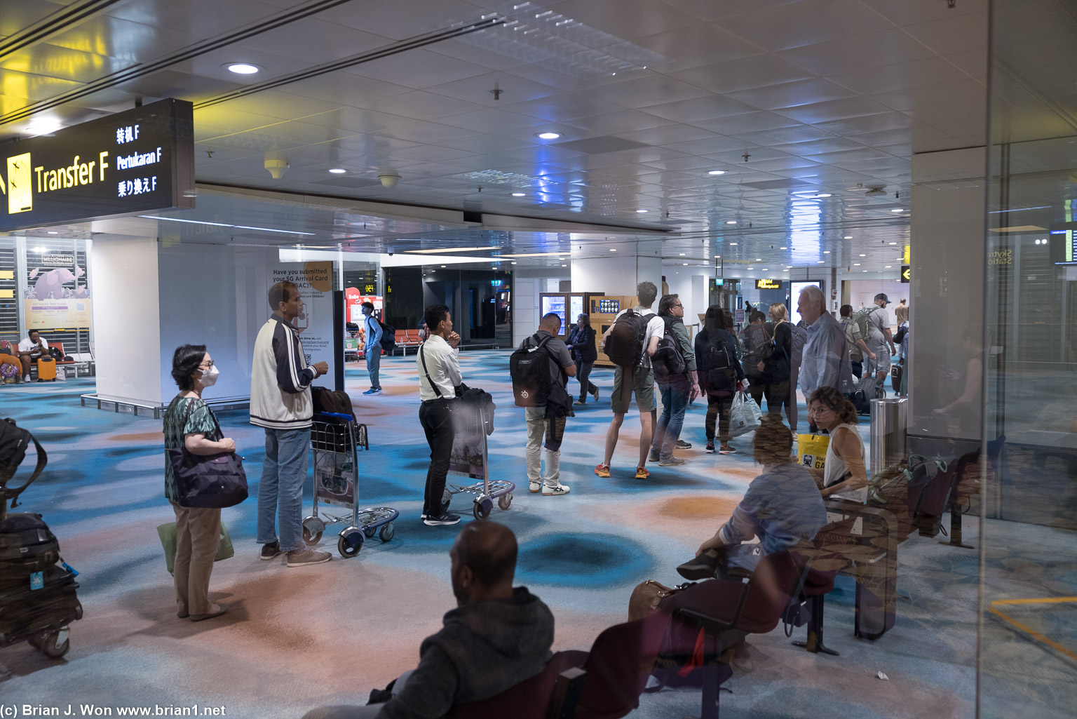 Passengers waiting to get in.