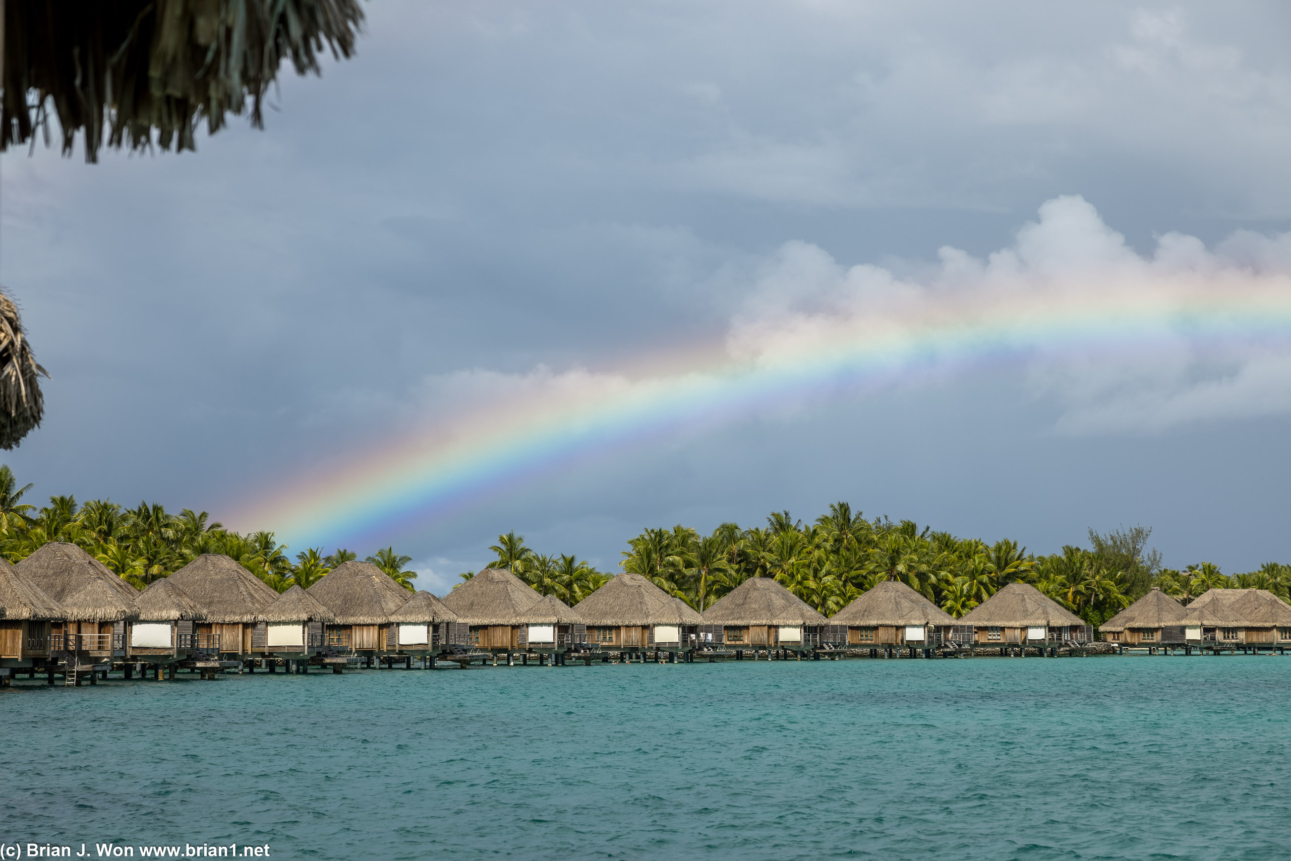 Rainbow over the expensive overwater bungalows.