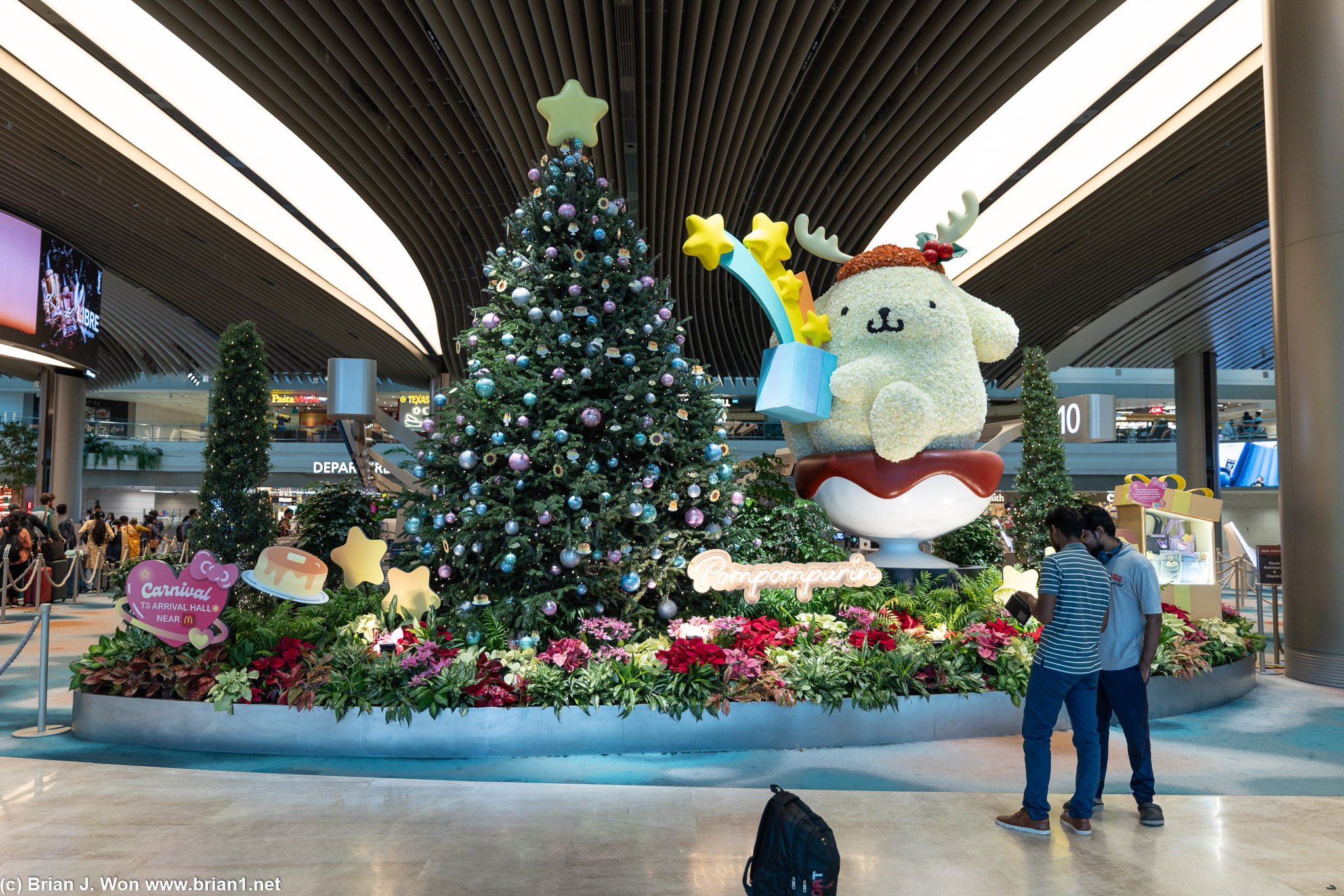 Pompompurin (Sanrio?) Christmas display inside Terminal 2.