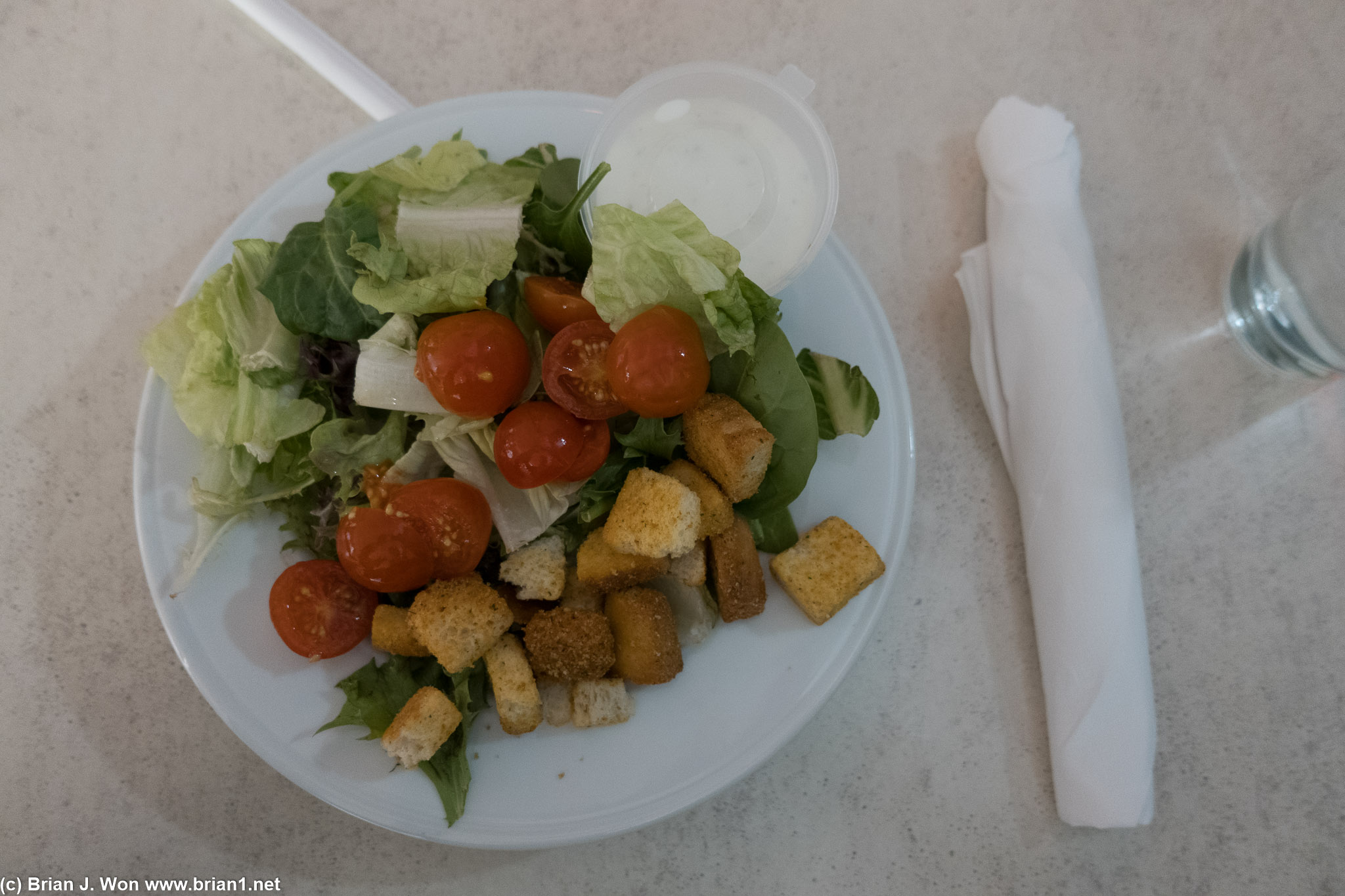 Salad clearly out of a bag, but at least it's a nice bag.