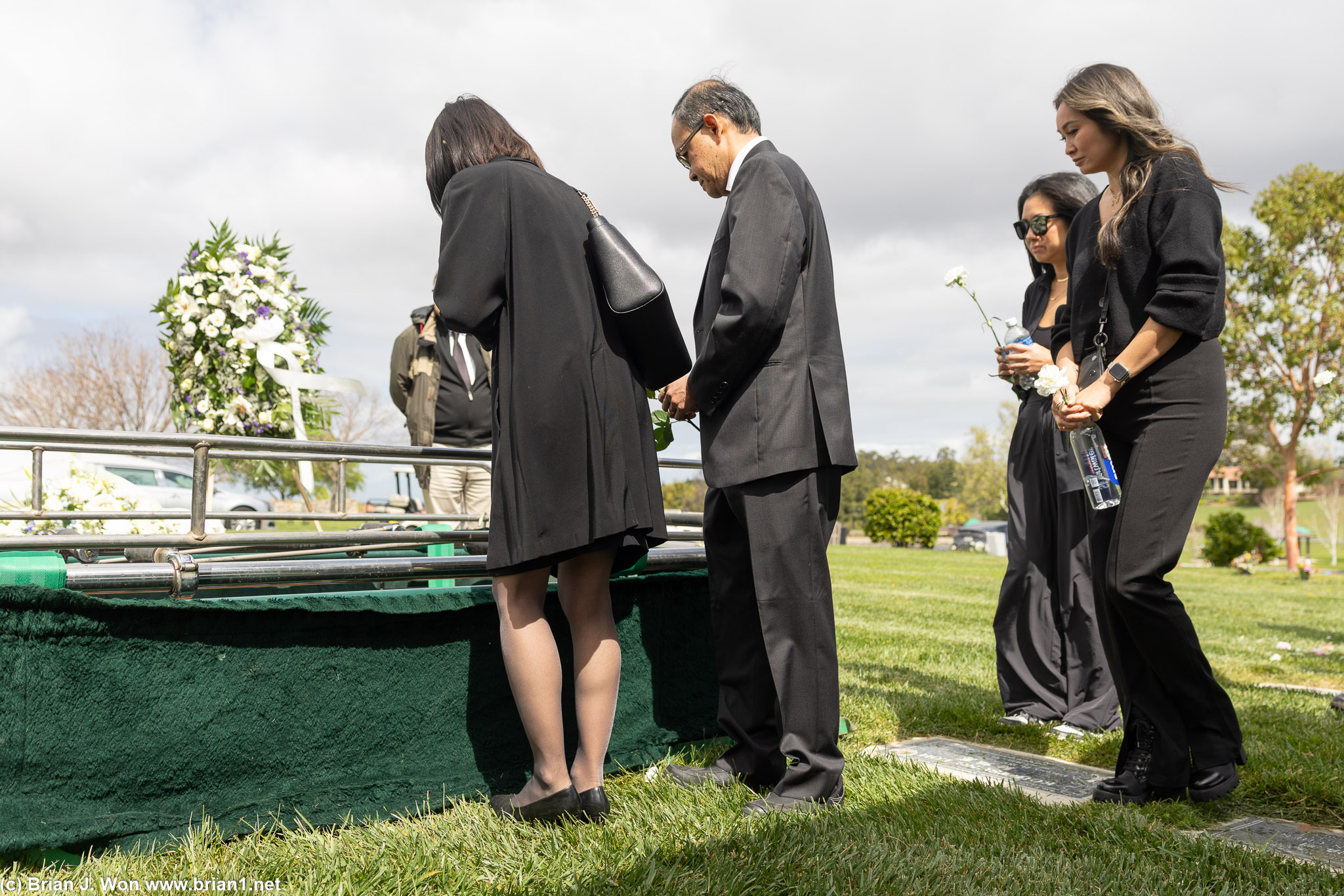 Family and friends paying respects.