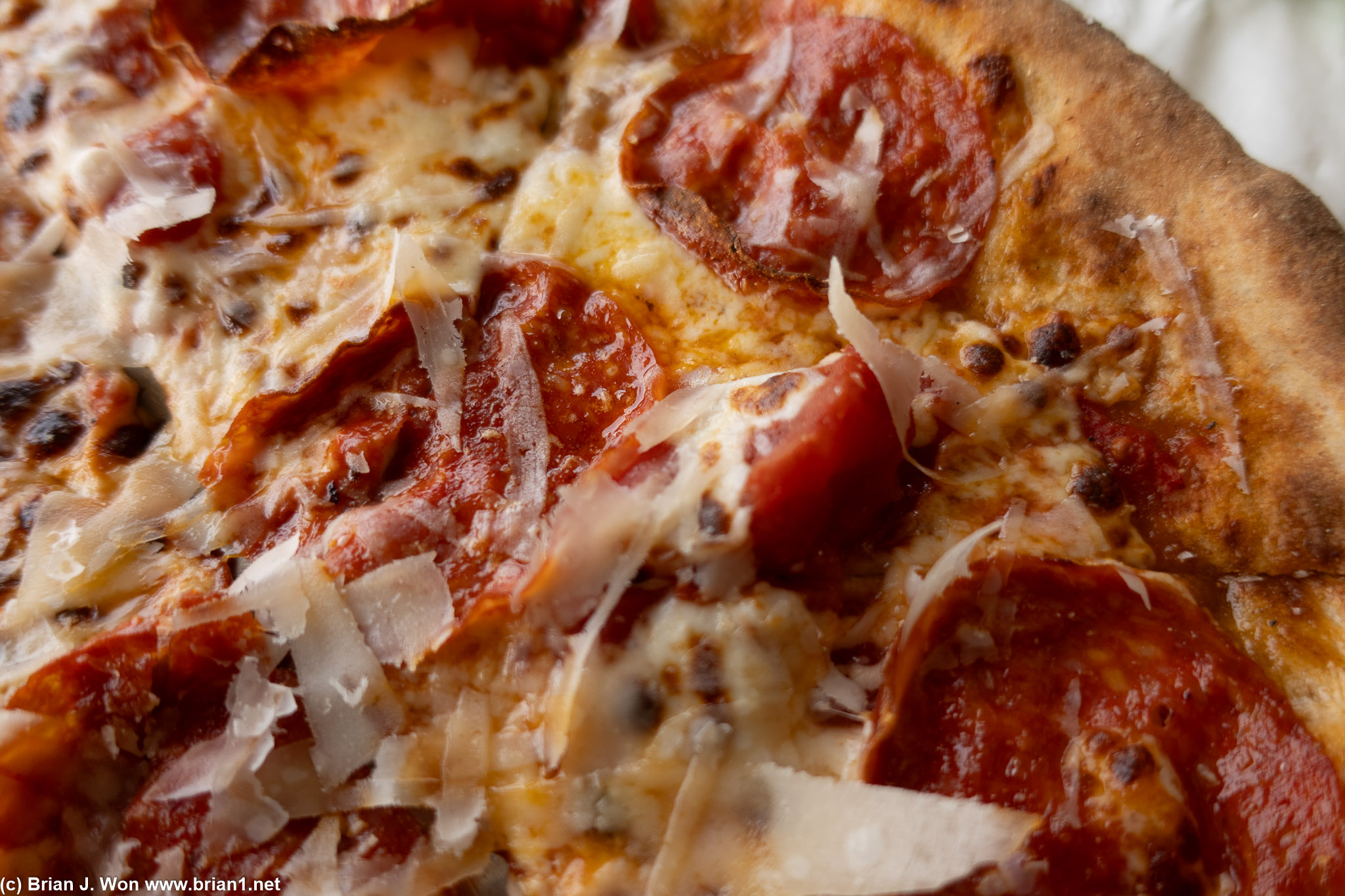 Medium-thin crust, a bit too thick, and not nearly enough pepperoni.