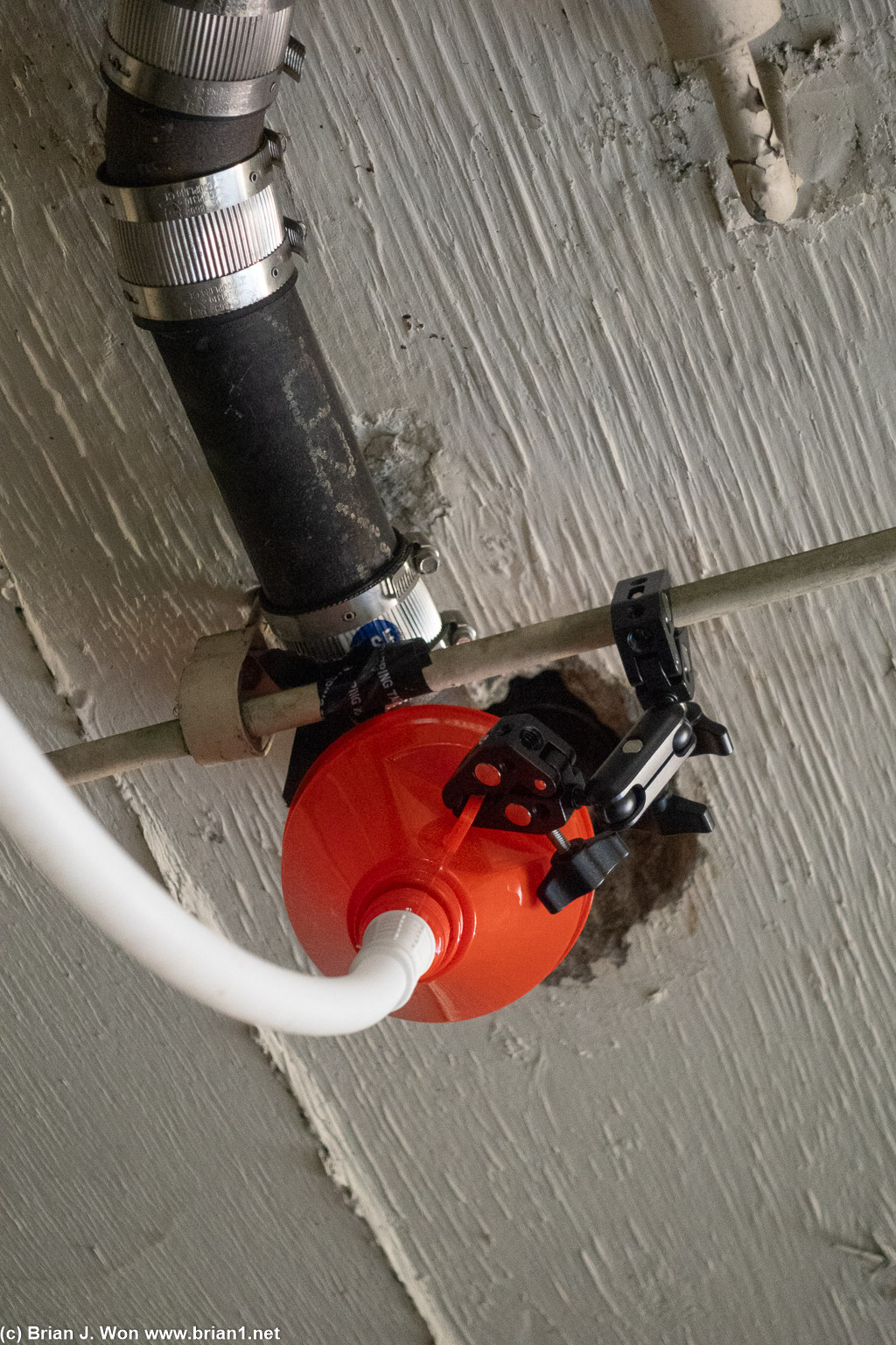 Funnel to divert the leak.