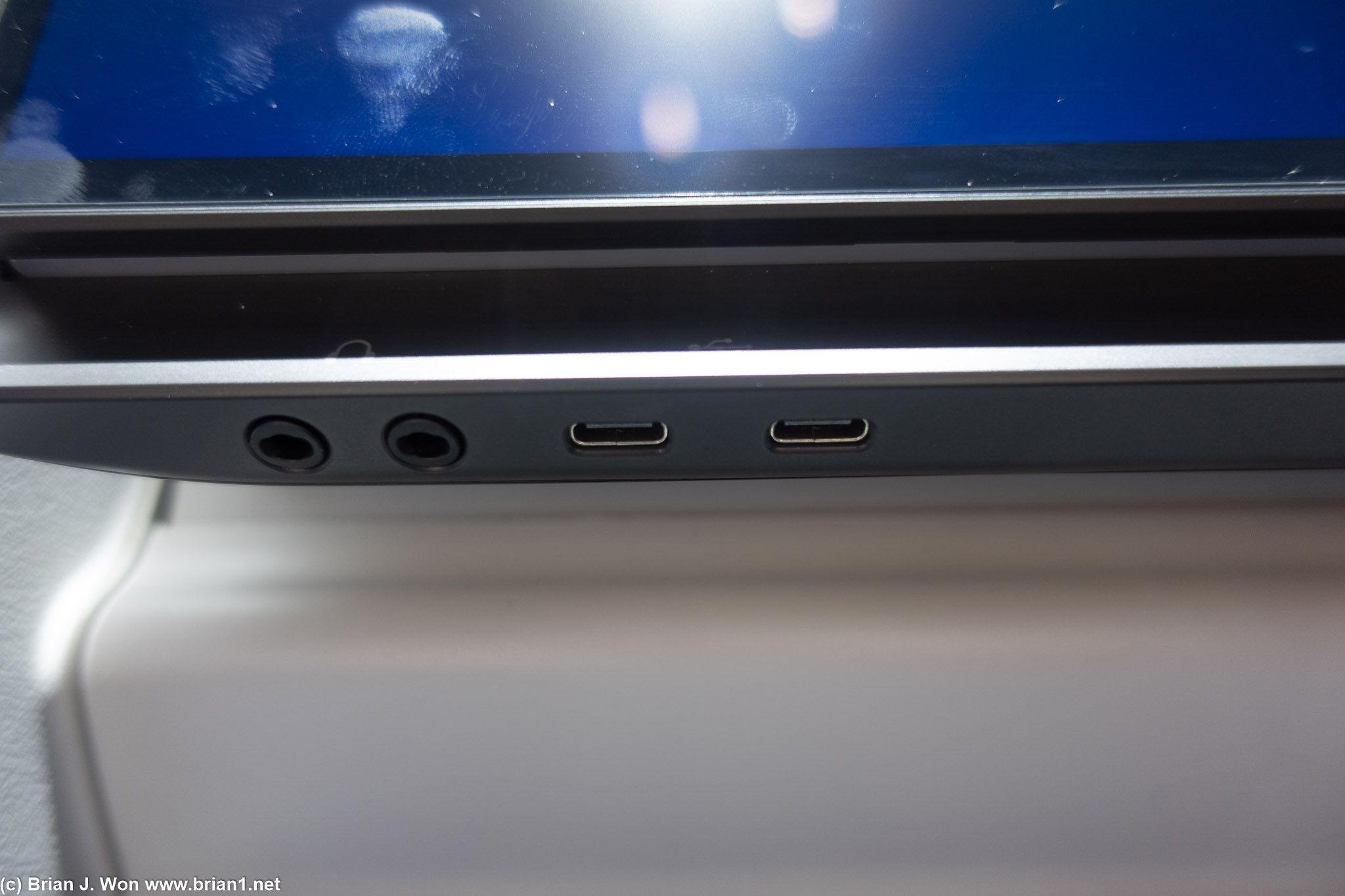 Close-up of audio and USB-C power. Not sure if 65W per outlet or 65W total.