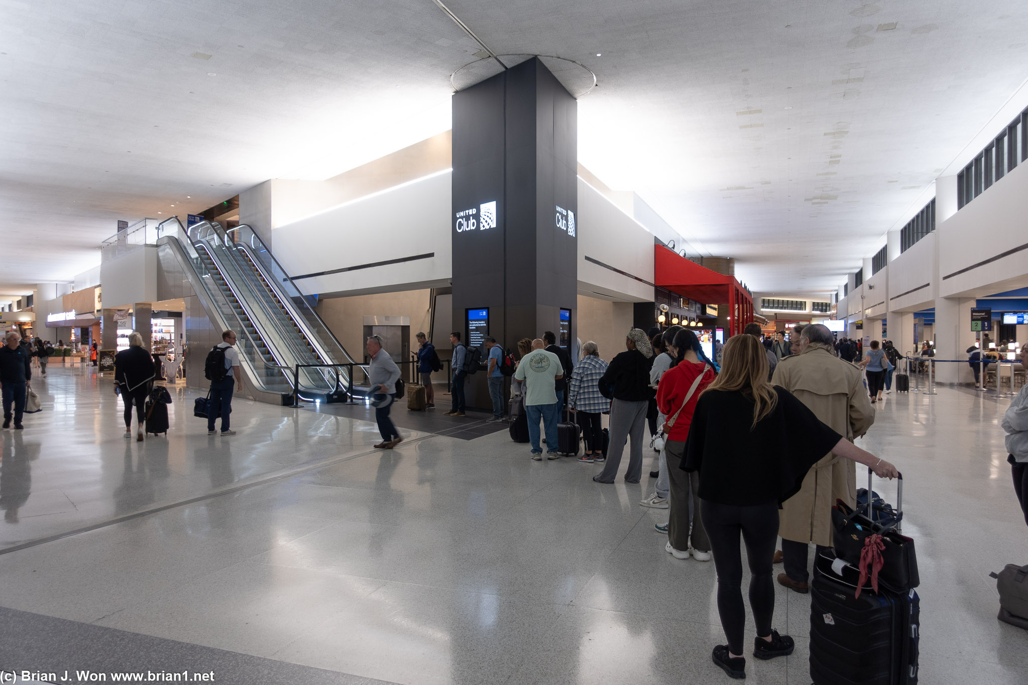 Long line for the United Club before it opens at 5:00am.