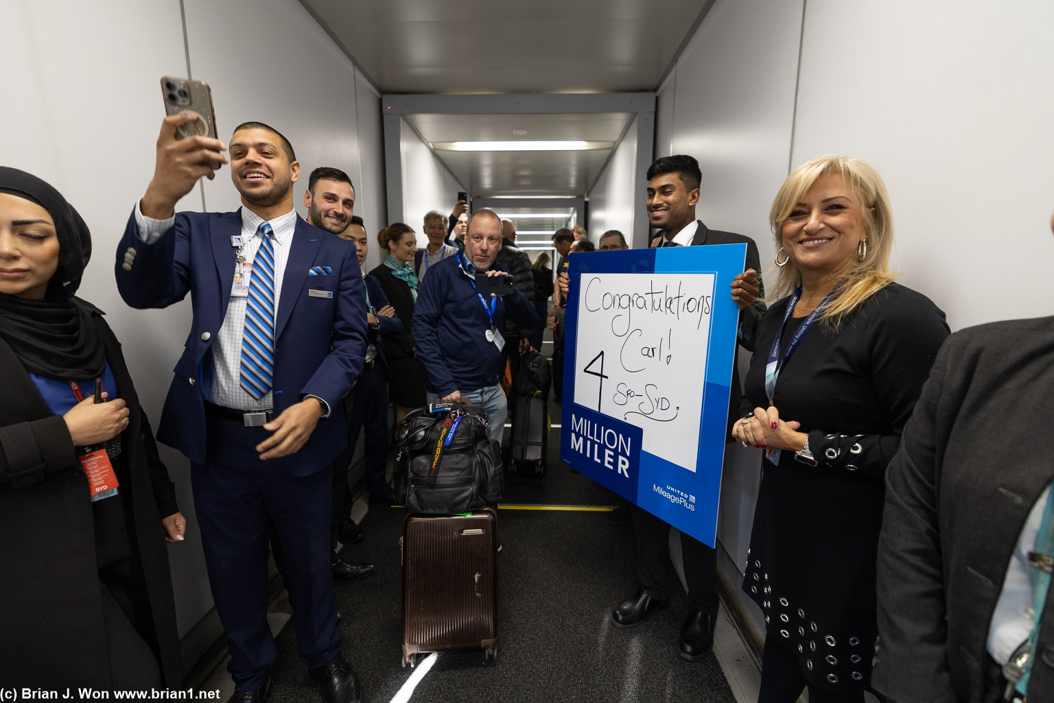 Susan and her Sydney-based crew welcoming the new 4 million miler and friends to SYD.