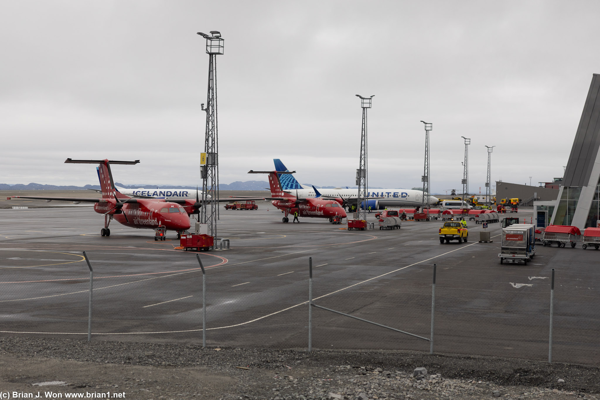United 737 MAX 8 next to Iceland Air 737 MAX 8 and Air Greenland DHC-8-200.