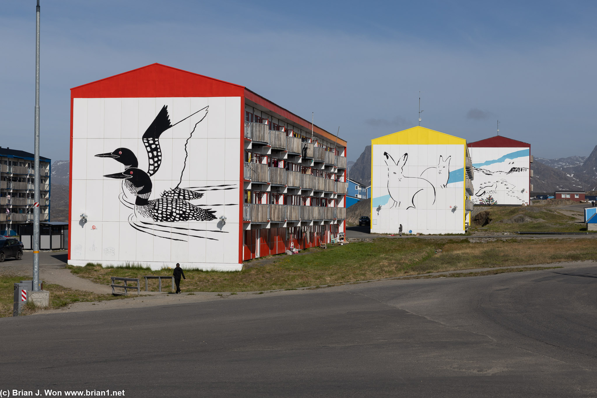 Well-cared for artwork on some old apartment buildings in Sisimiut.