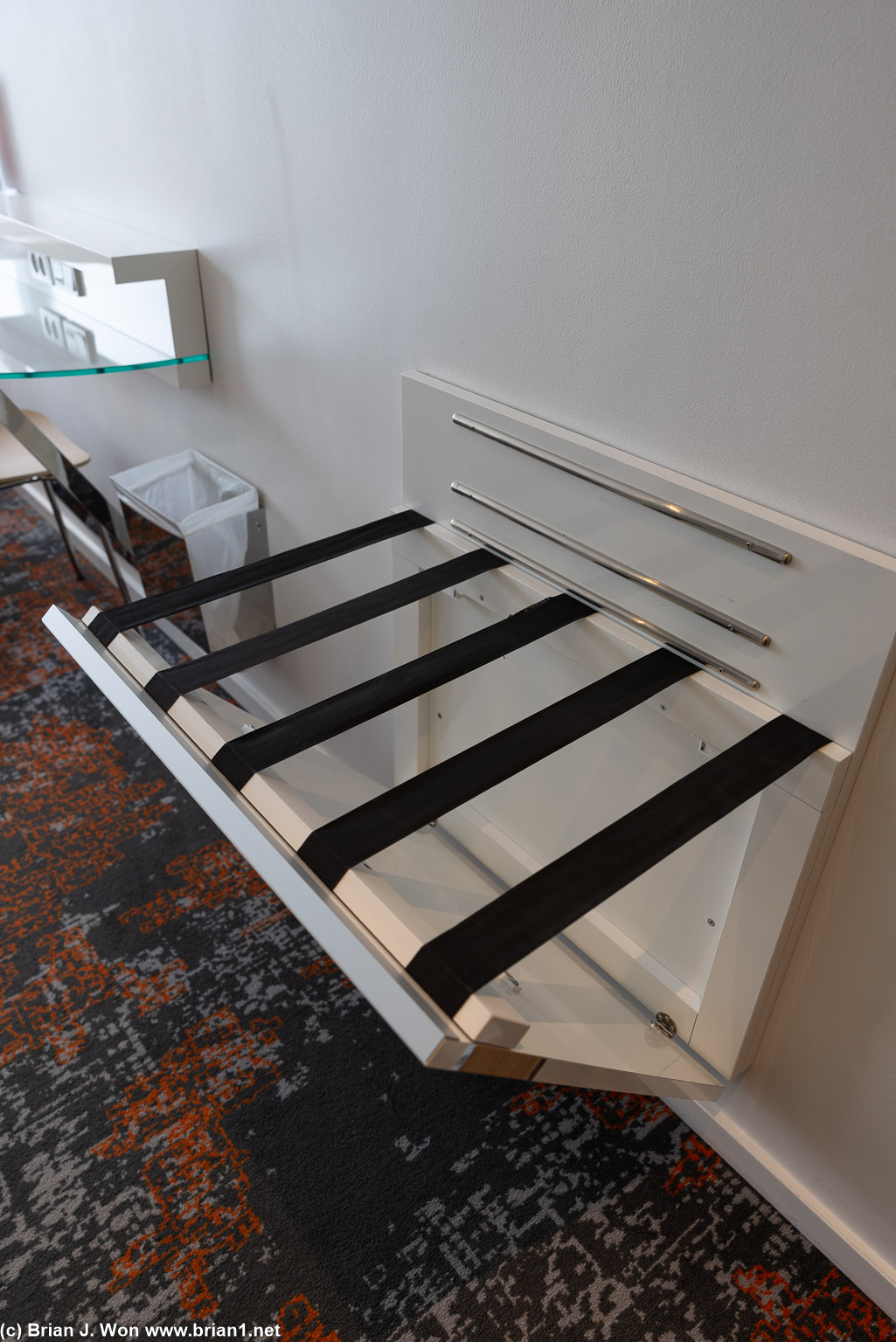 Integrated luggage stand.
