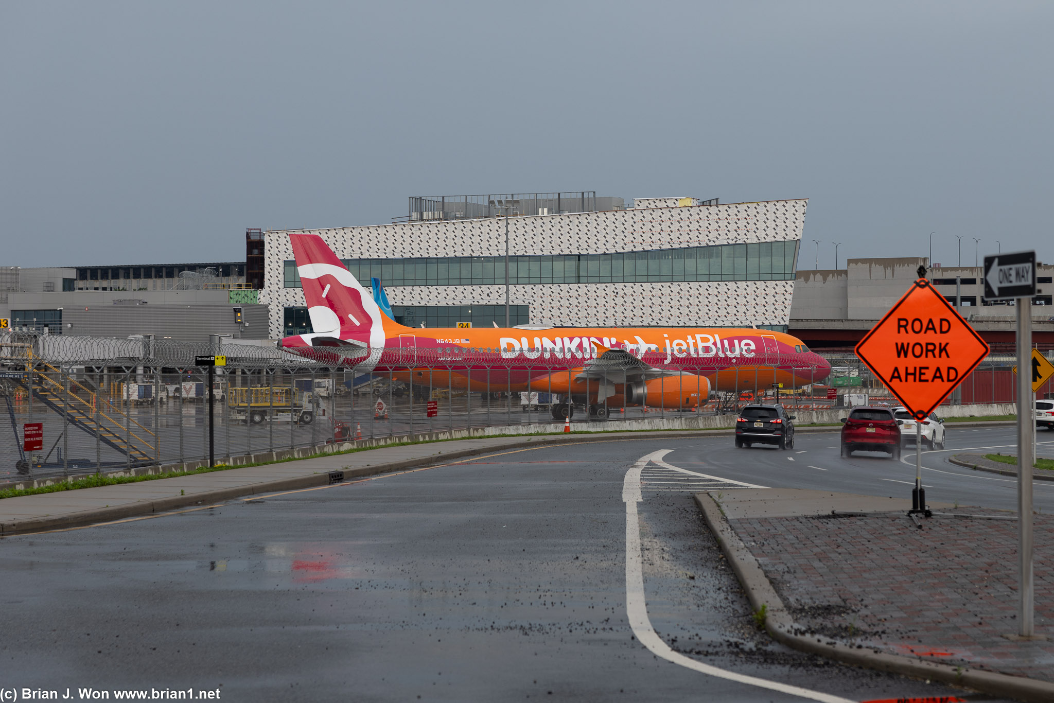 JetBlue's Dunkin' Donuts livery Airbus A320 parked at Newark International Airport.