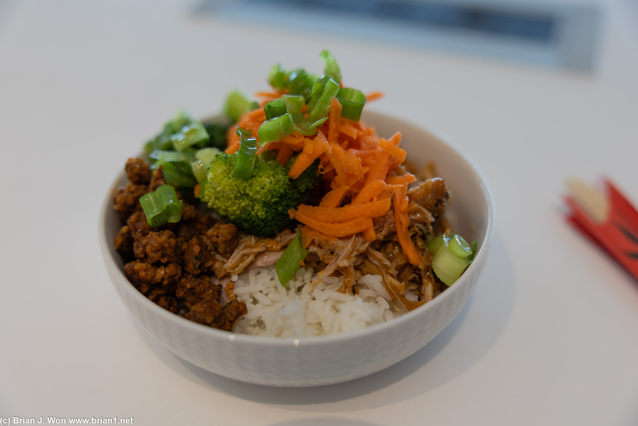 Spicy veggie chorizo, chicken, rice, veggies at the United Club in Concourse C1.