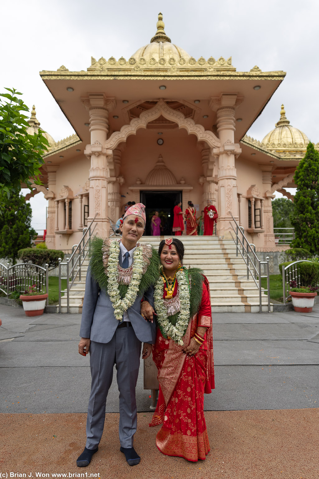 Bride and groom outside the temple.