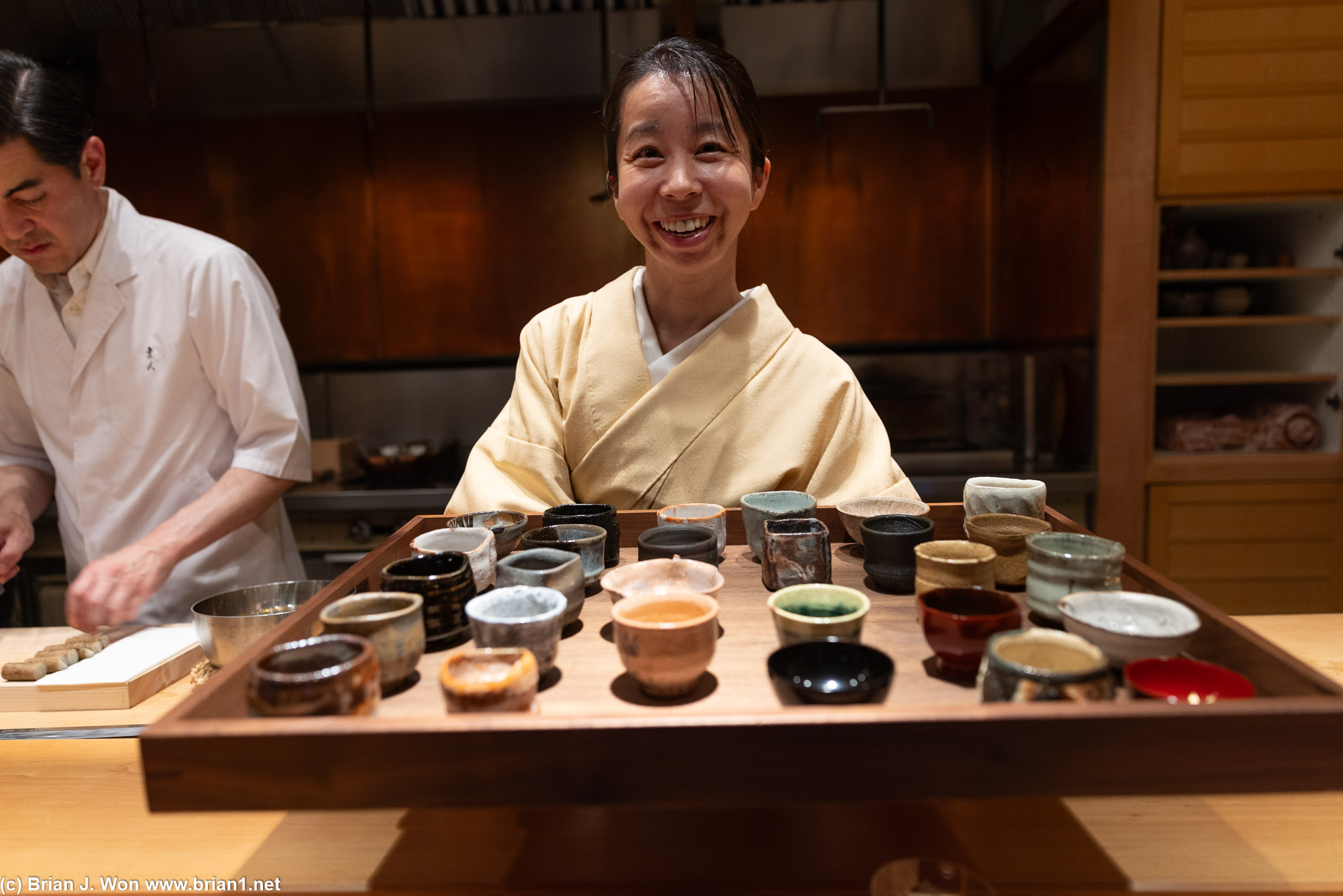 KK serving more sake glasses.
