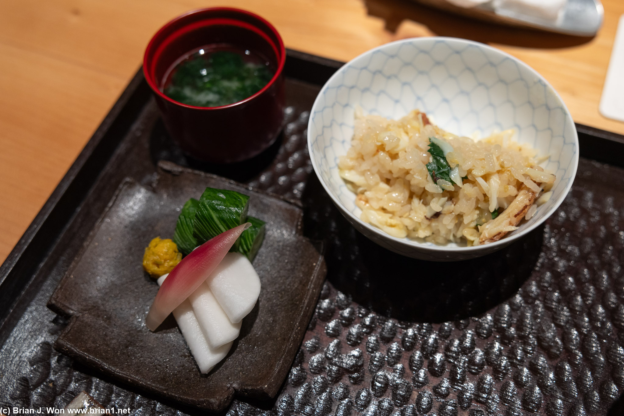 Dungeness crab rice, tea, chrysanthemum petals, onion.
