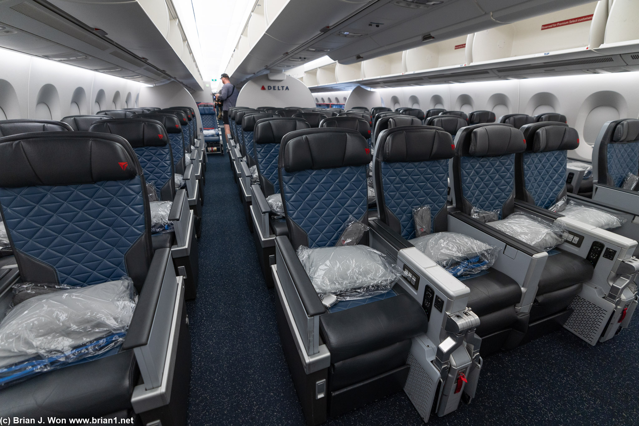 Massive premium economy (Premium Select) cabin with 48 seats (48W).