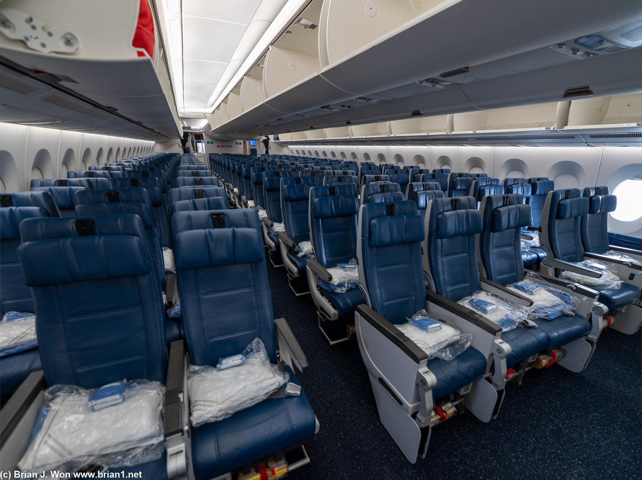 Economy cabin is same Recaro CL3710 seats. Bulkhead is way to go.