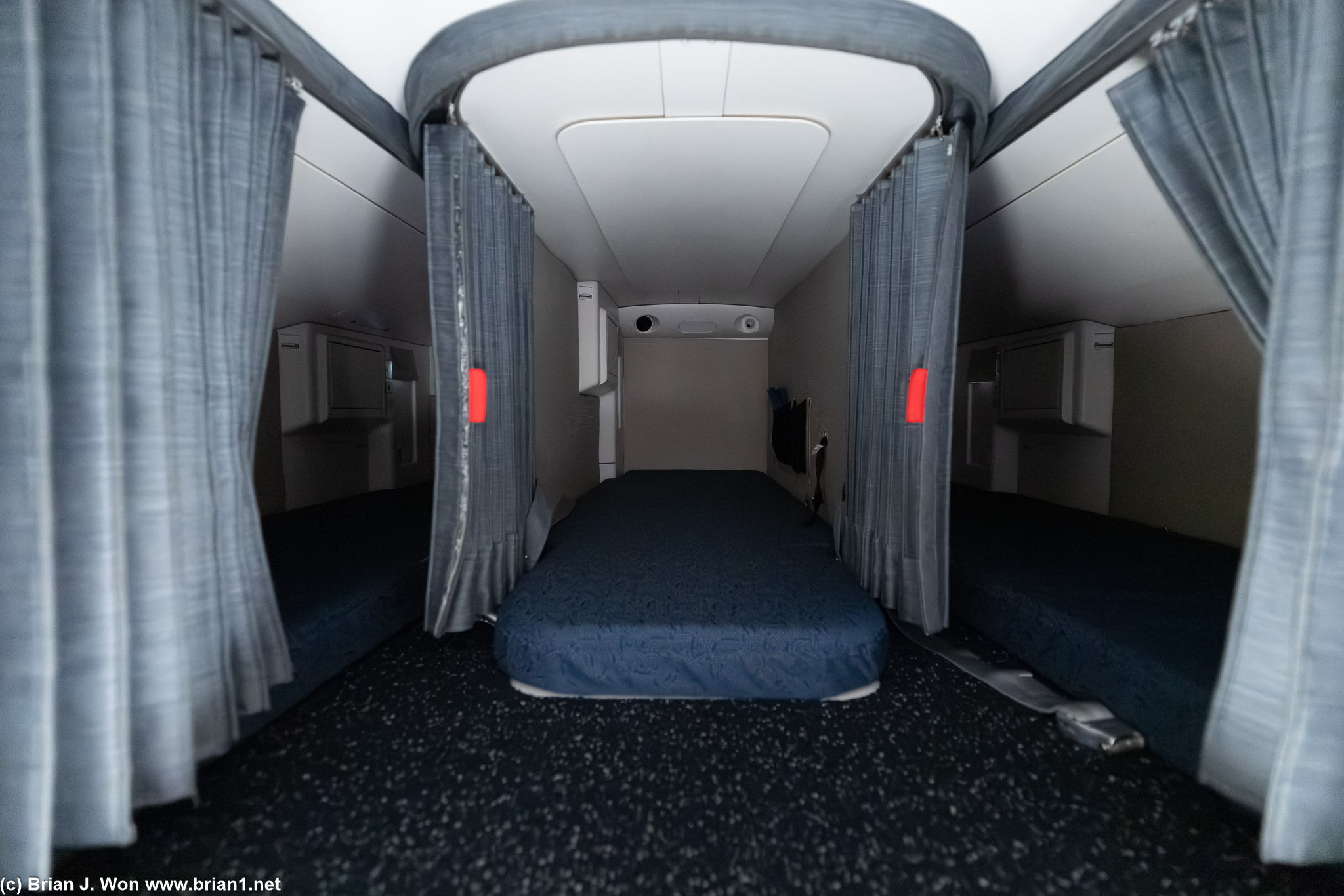 Three bunks deeper in are like a dark cave.