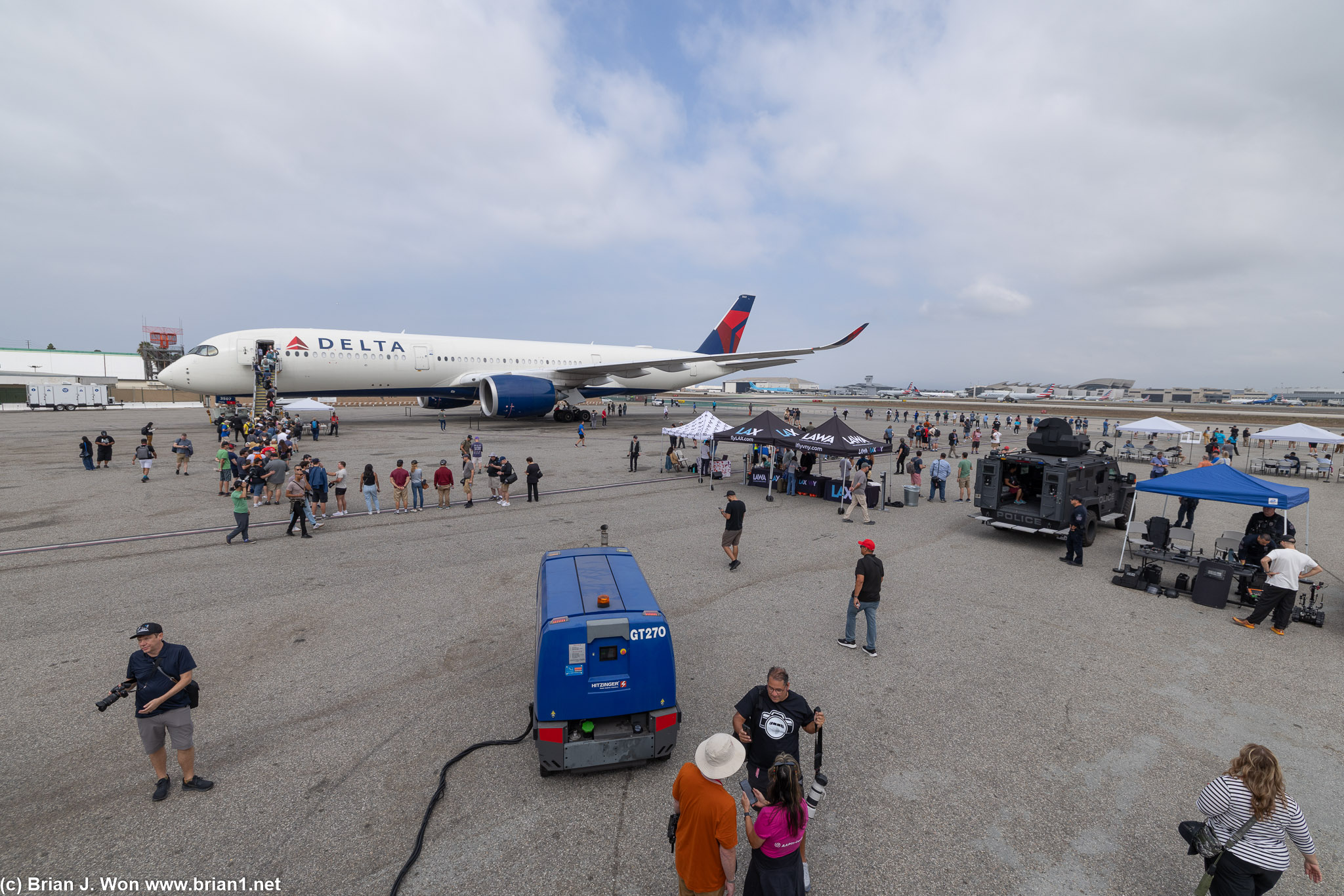 Delta A350, LAWA tents, LAPD with drones and SWAT truck, power generator cart.