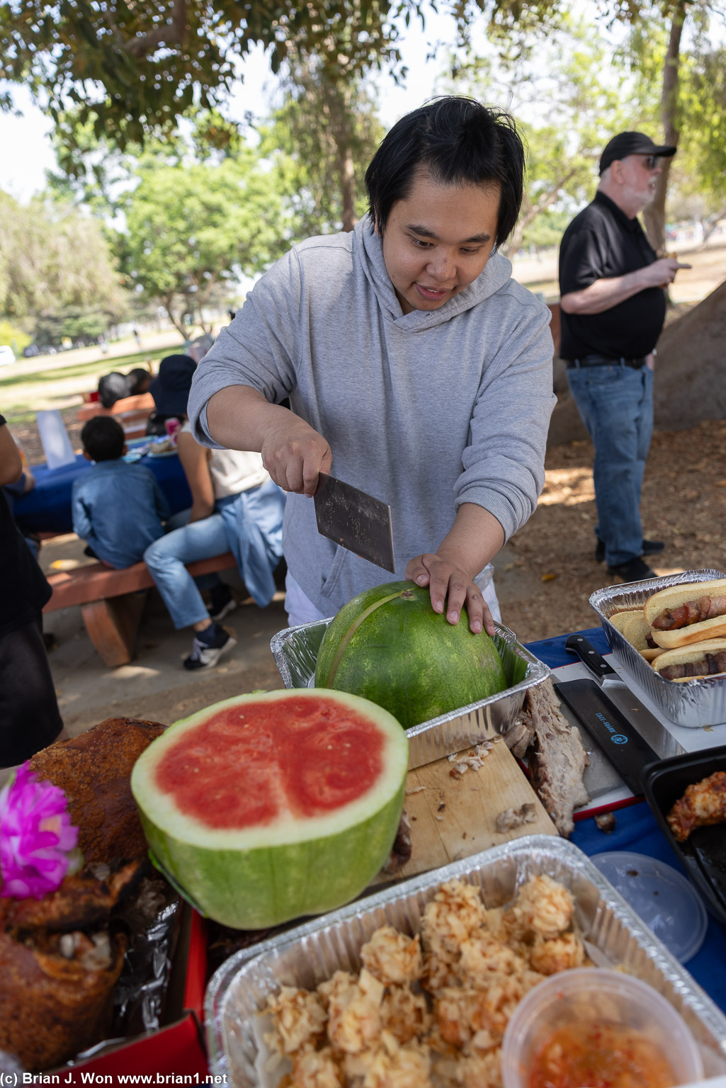 Madison carving watermelon.