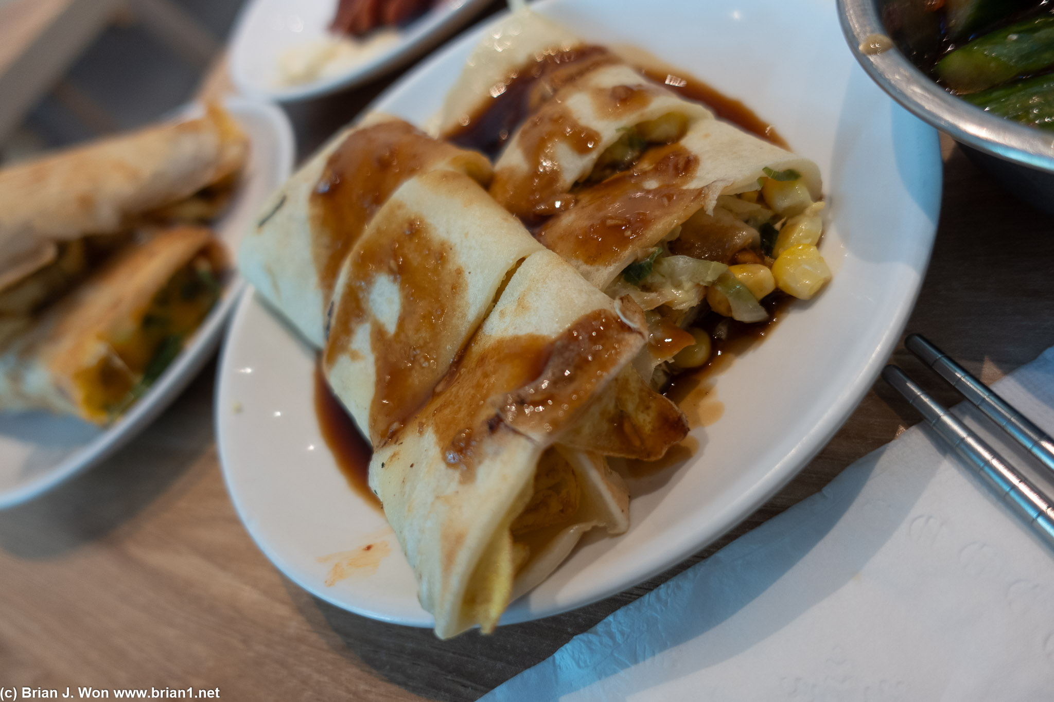 Dan bing (Taiwanese crepe, scallions, eggs, corn, cabbage).