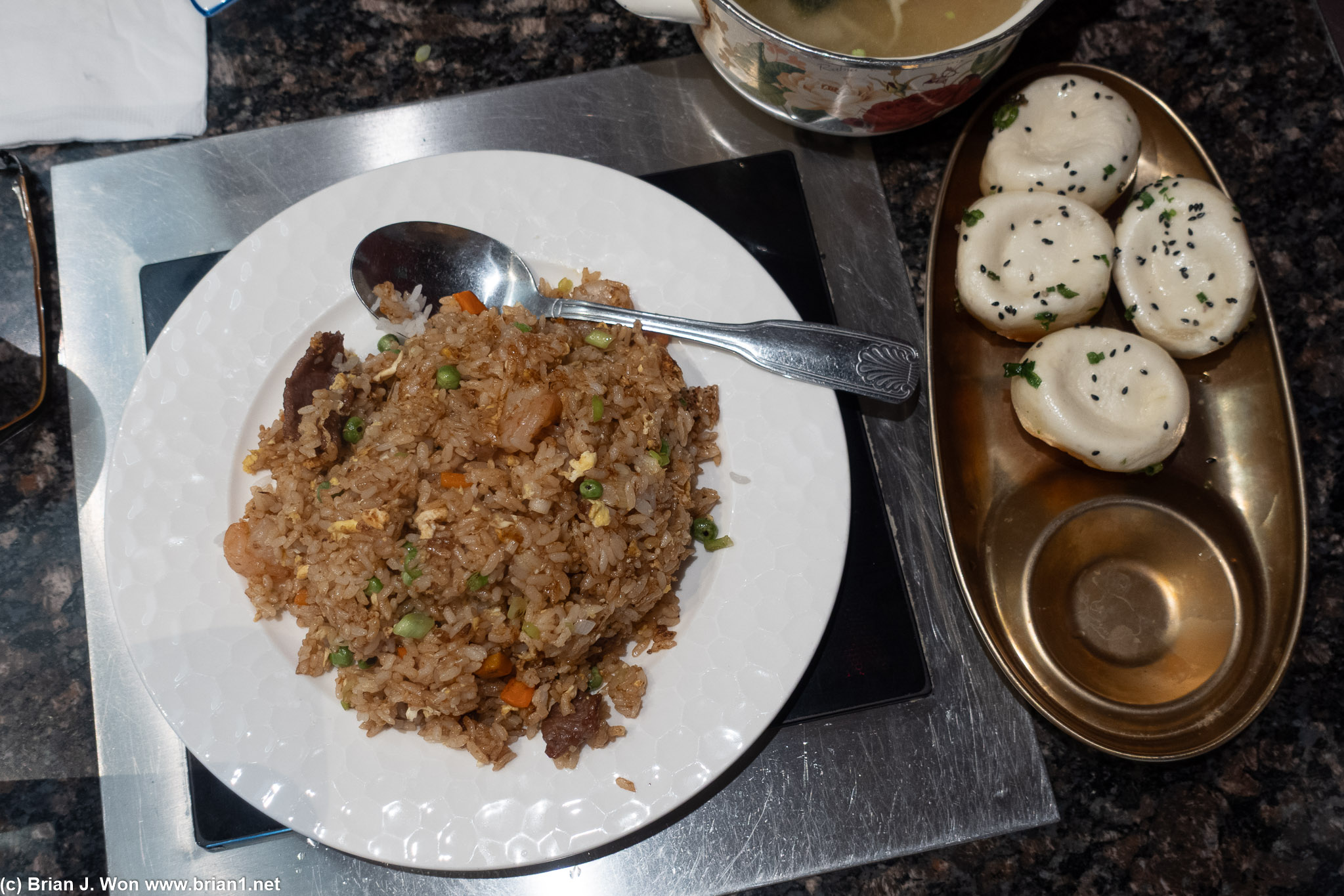 Beef and shrimp fried rice at left, sheng jian bao at right.