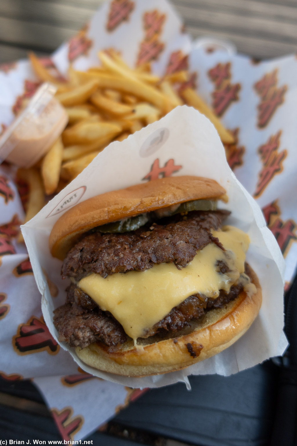 Triple burger combo meal, requested only one slice of cheese.