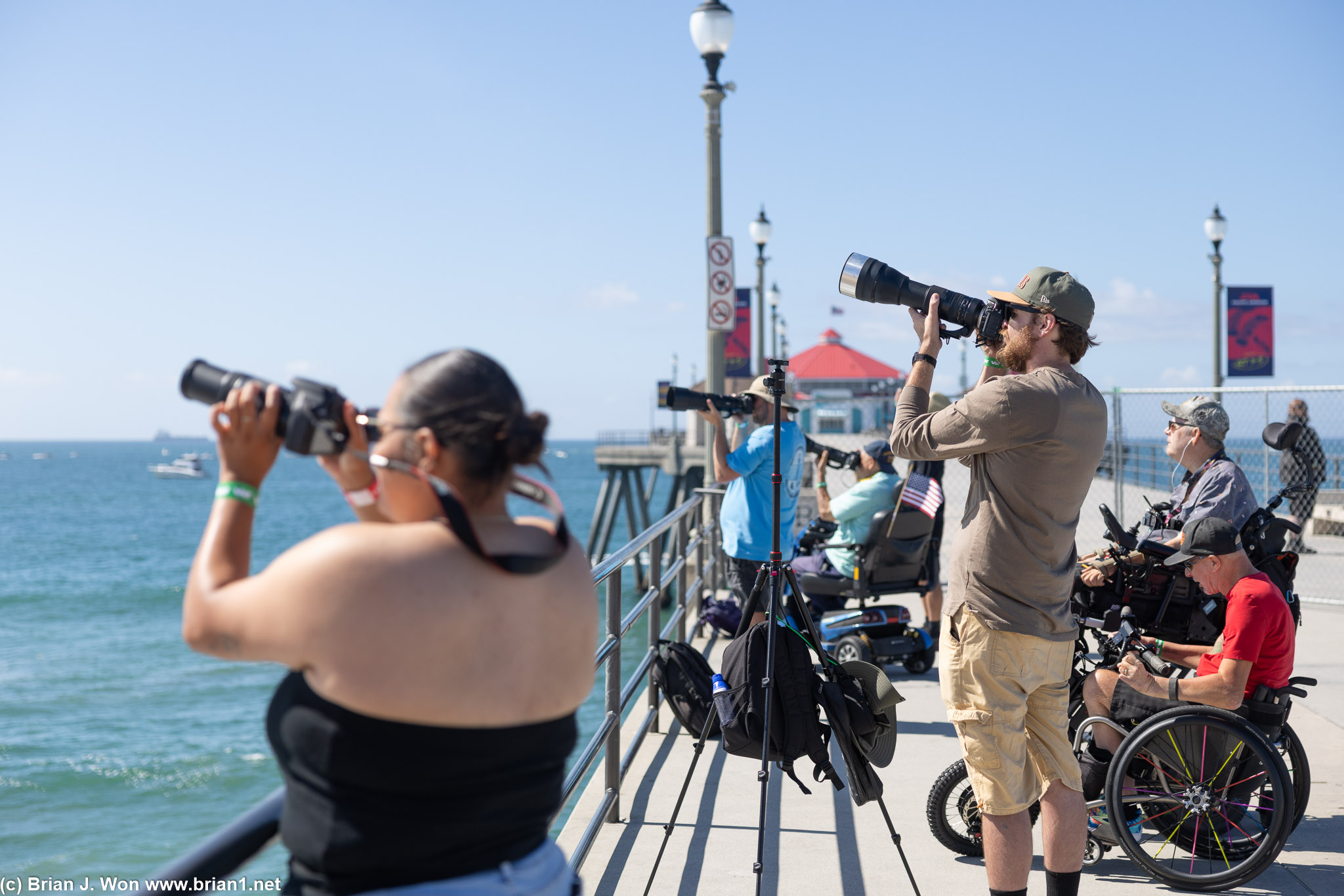 Photographers who have a little extra coin pay for pier access.