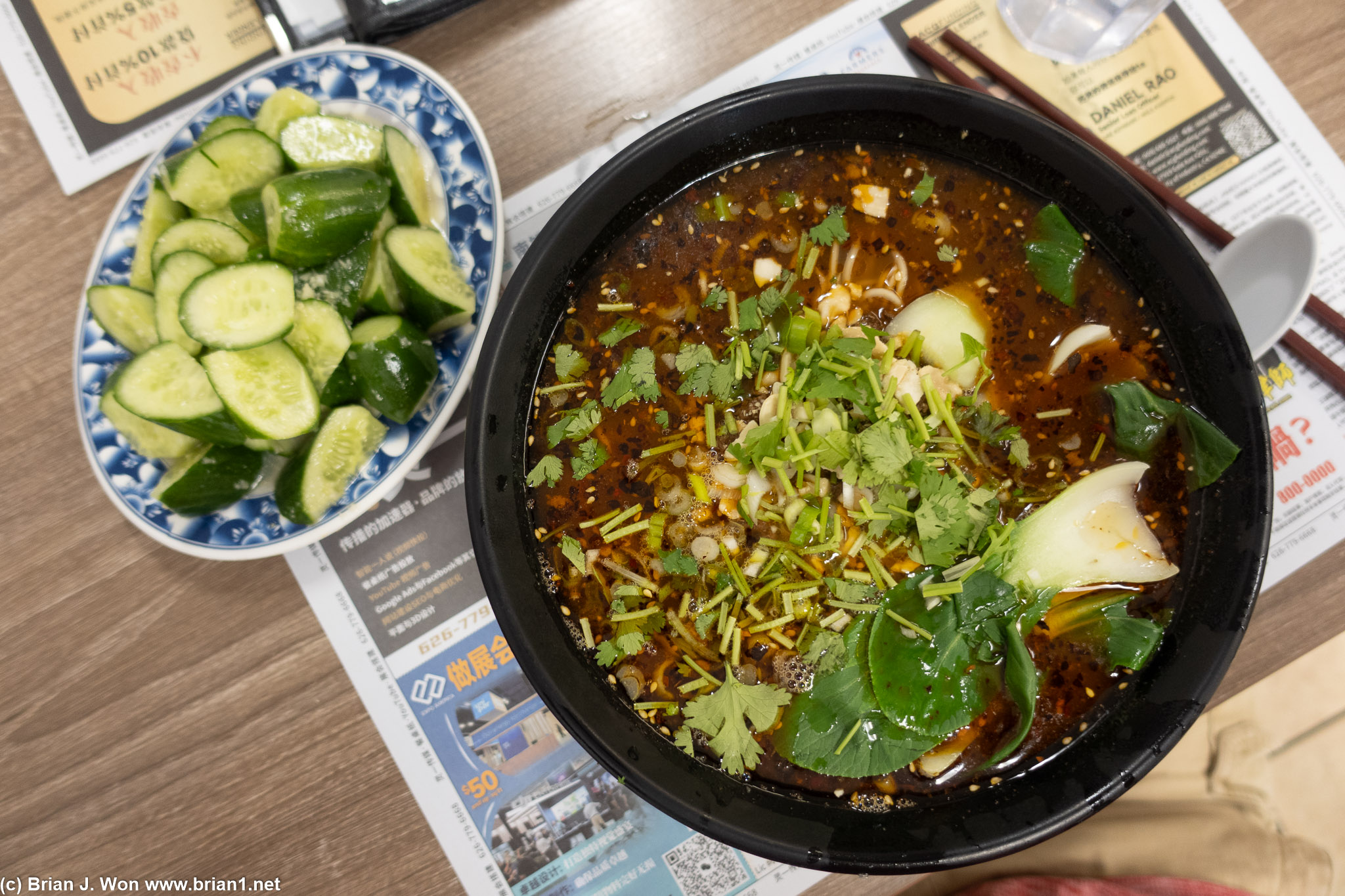 Chongqing spicy noodles and cold cucumber salad.