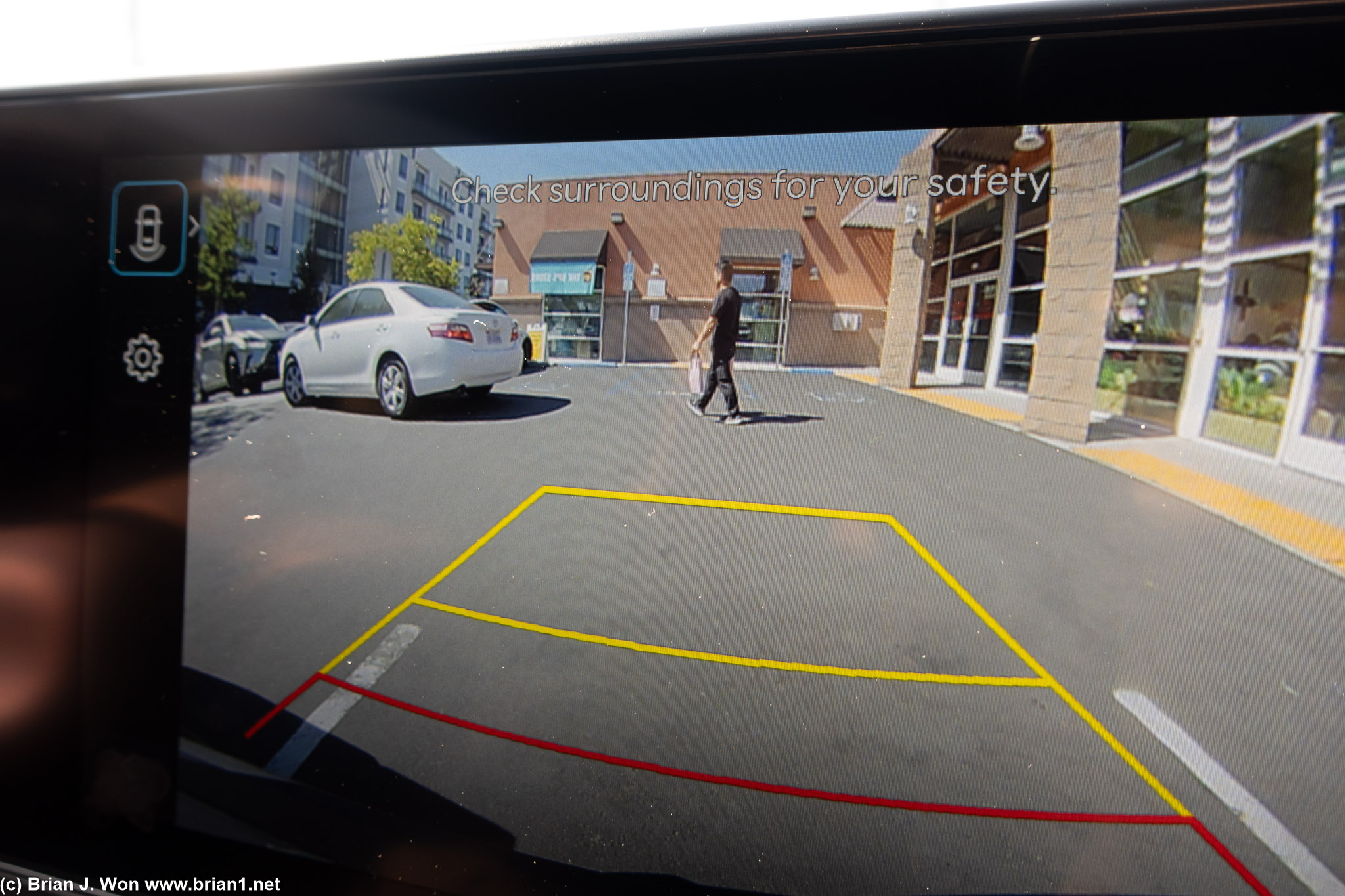 Idiot in Camry finally leaving, only... blocked in. Double sign.