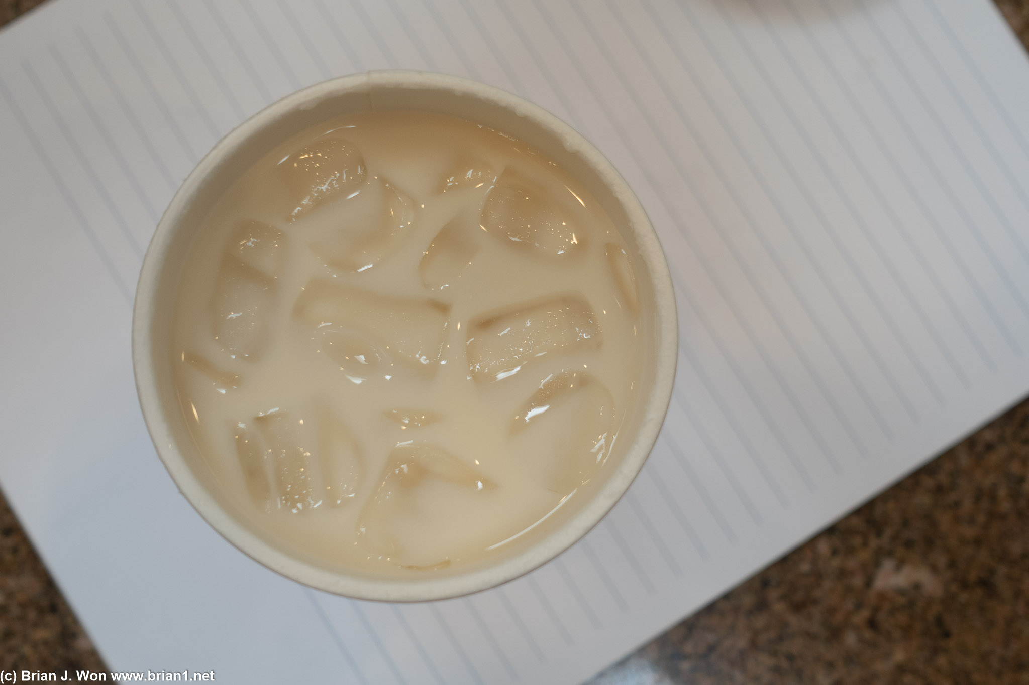 Peach tieguanyin oolong milk tea (seasonal).