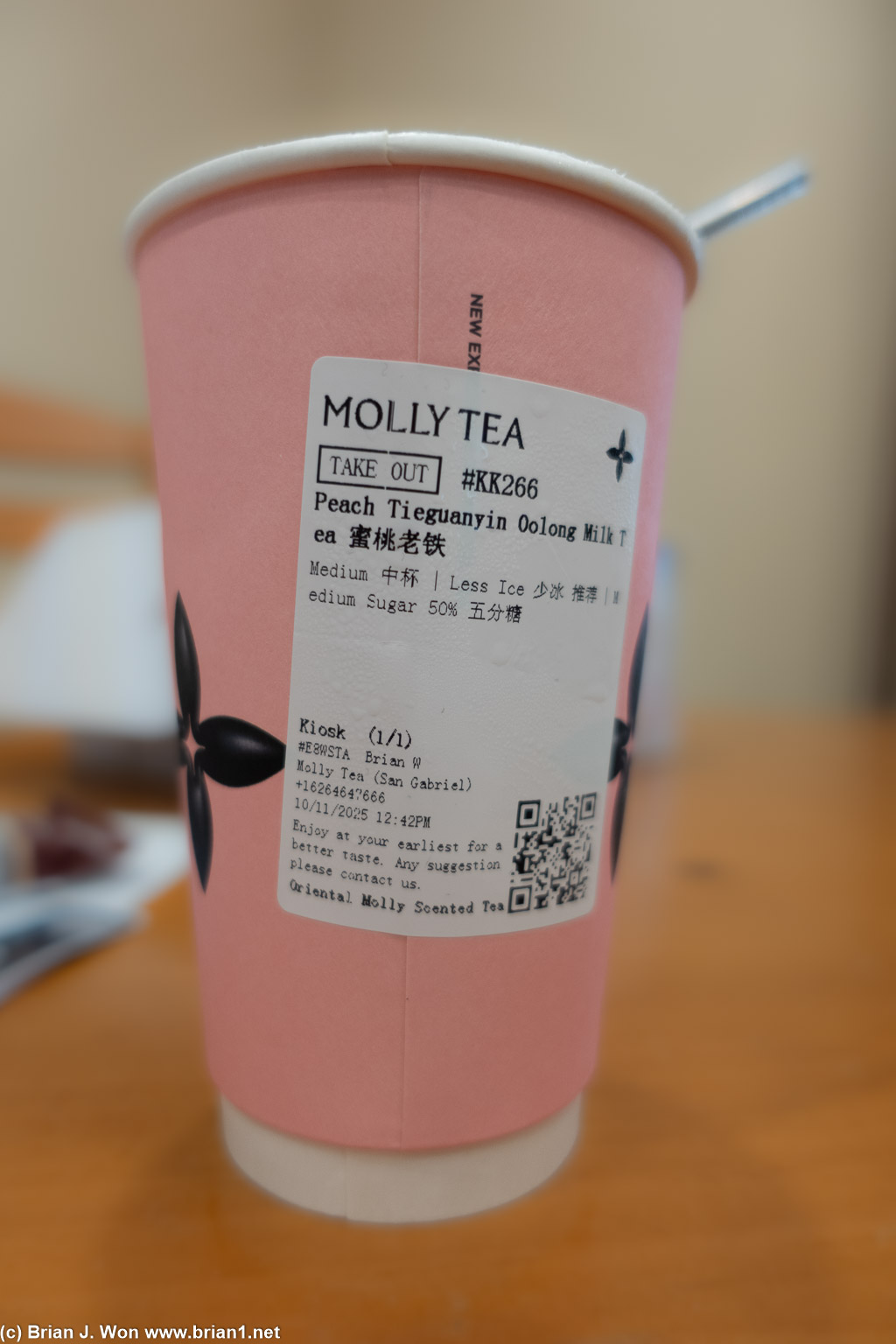 Peach tieguanyin oolong milk tea (seasonal).