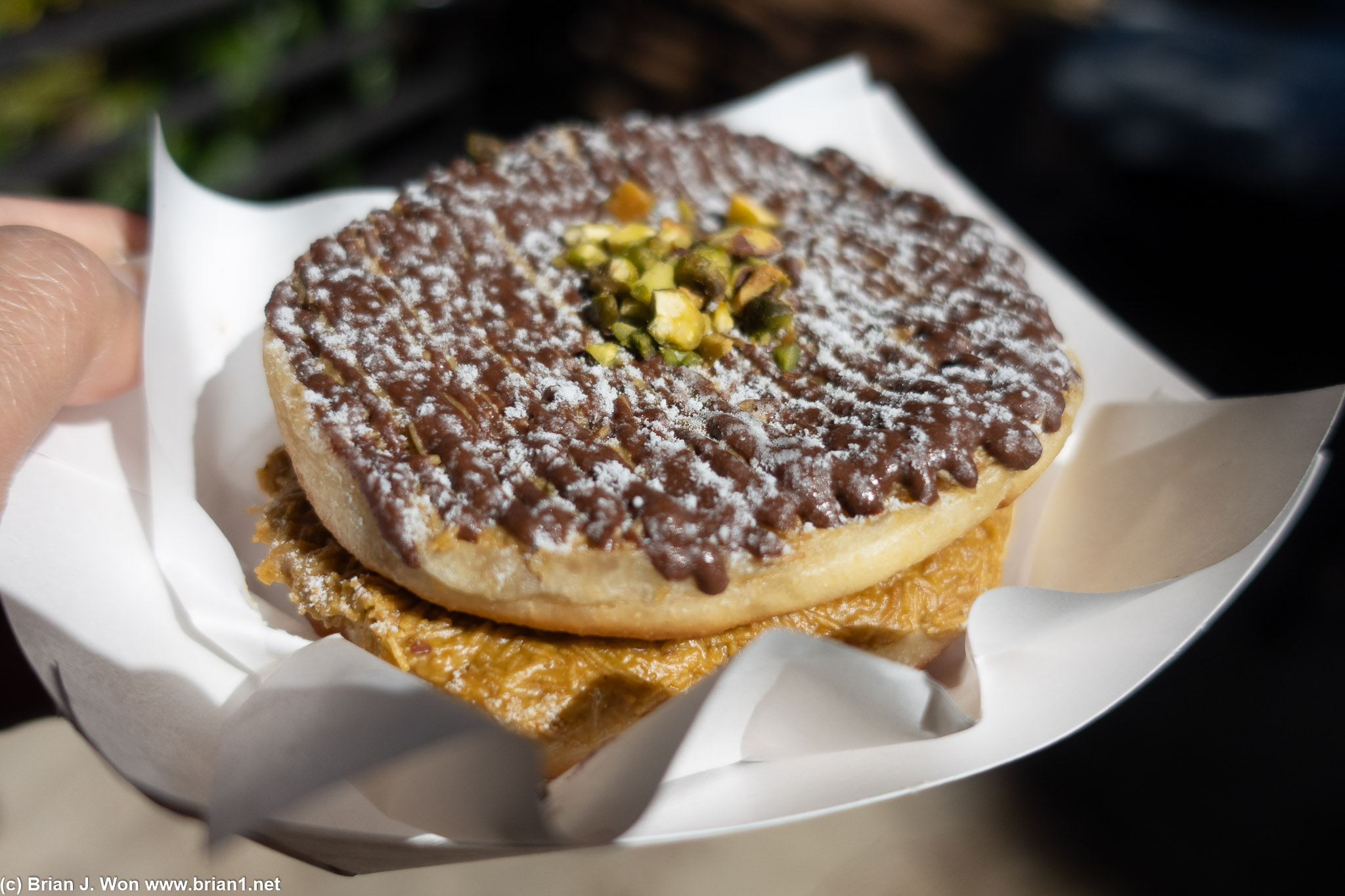 Pretty heavy donut, cut in half, with a honey-sweet layer in the middle.