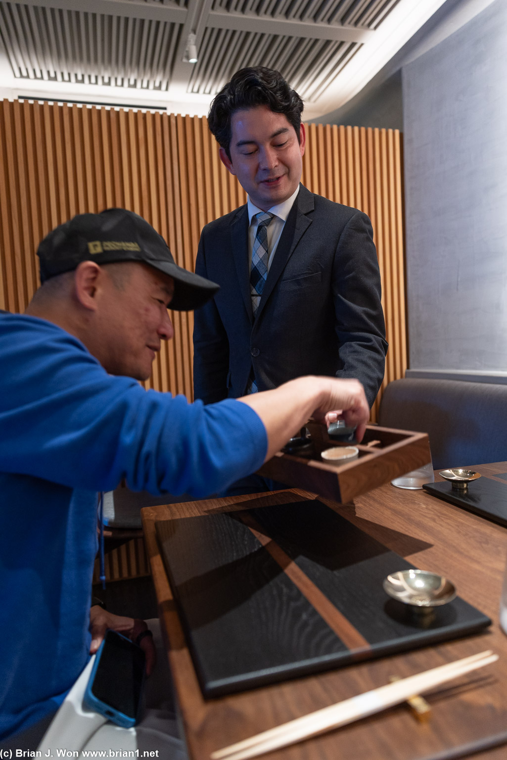 Selecting a sake glass.