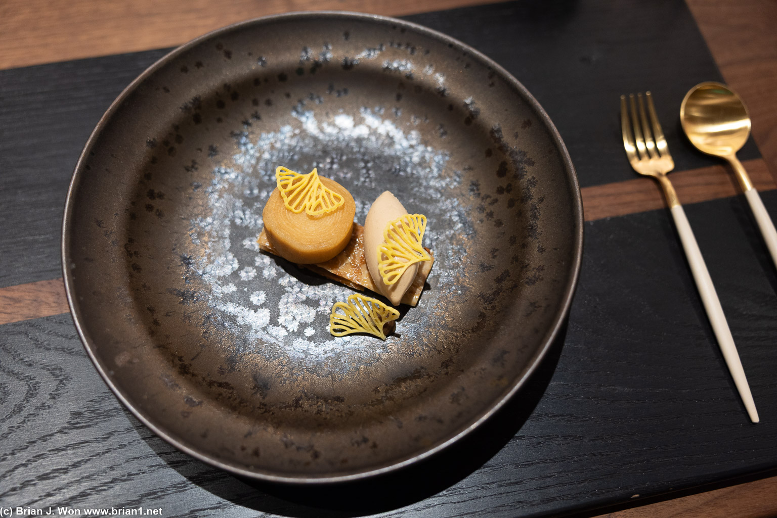 Shoyu koji ice cream, baked apple, kombu ganache, red kuri squash, pistachio mille-feuille.