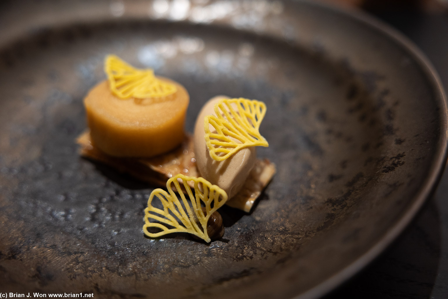 Close-up.  Apple on left.