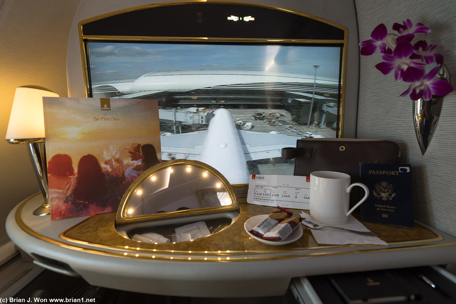 Menu, snacks, tea, amenity kit, tailcam...