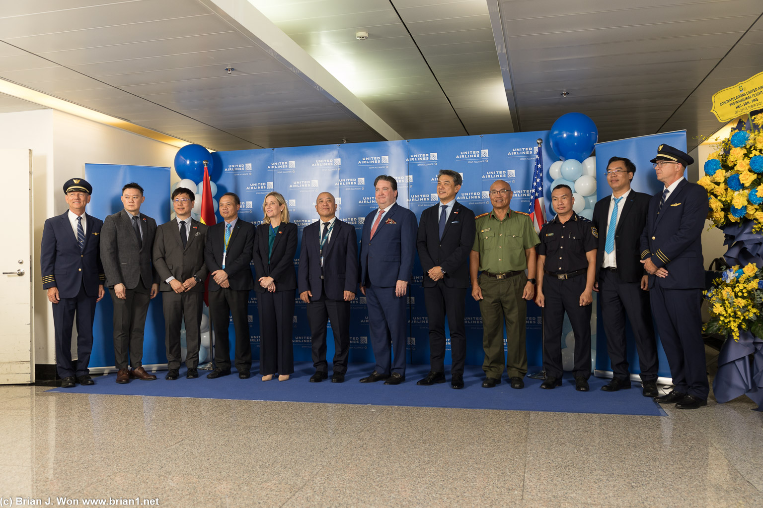 VIPs and pilots celebrating the start of United's HKG-SGN service.