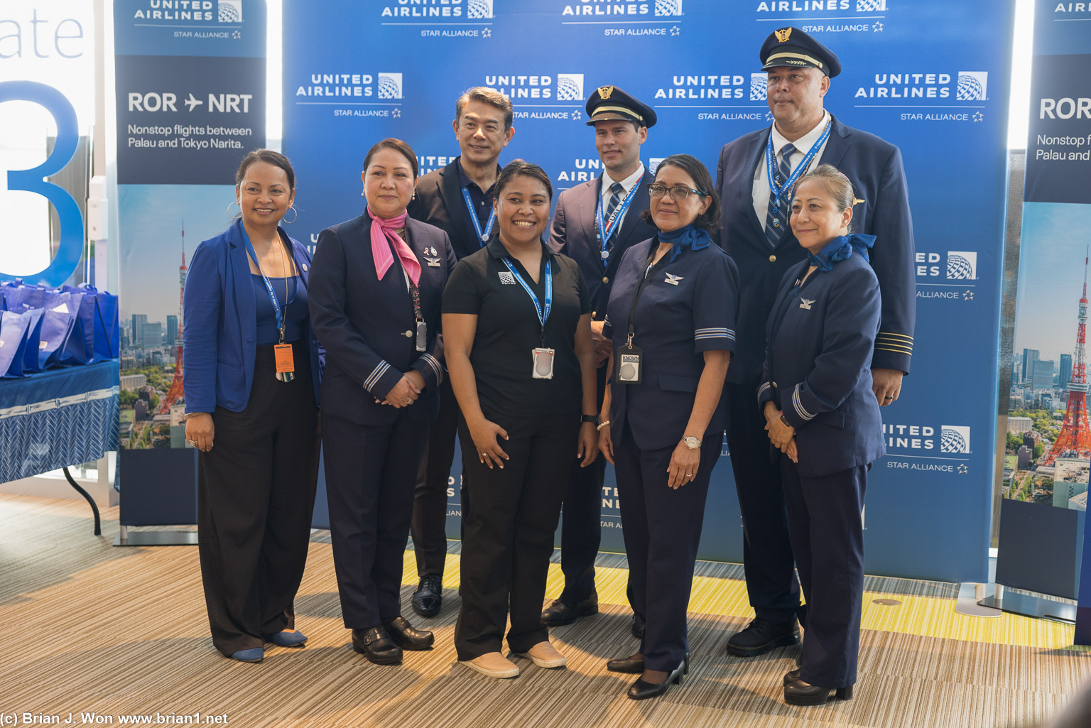 United VIPs and flight crew.