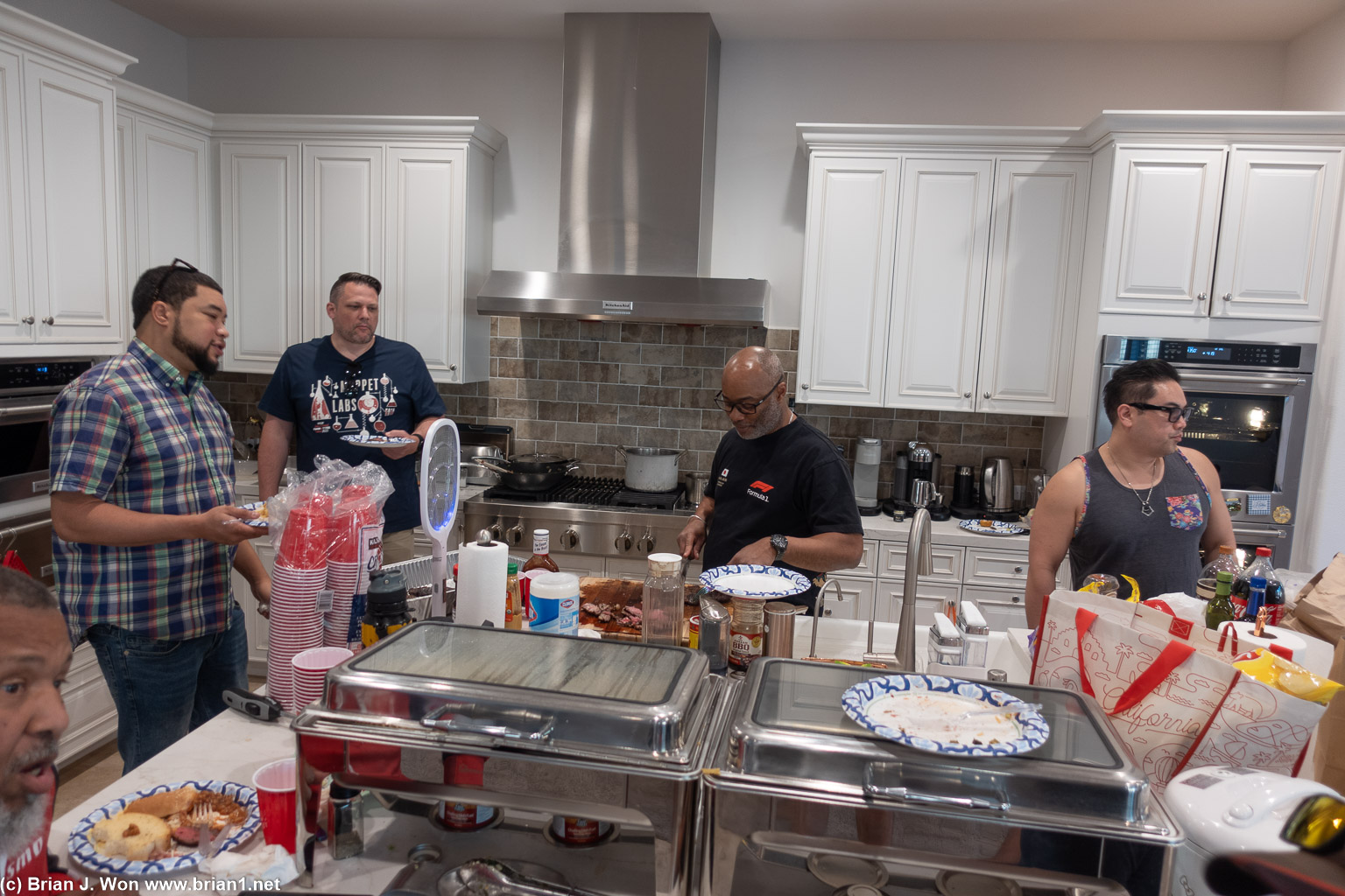 Q and Christine make full use of the kichen.