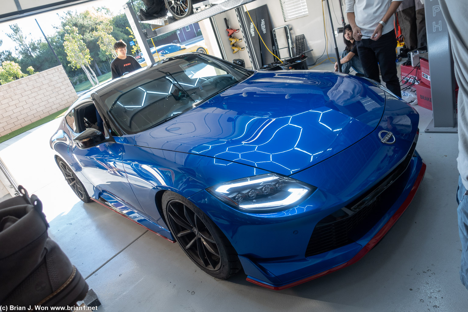 Nissan Z with Alpharex headlights and Nismo bumper conversion.