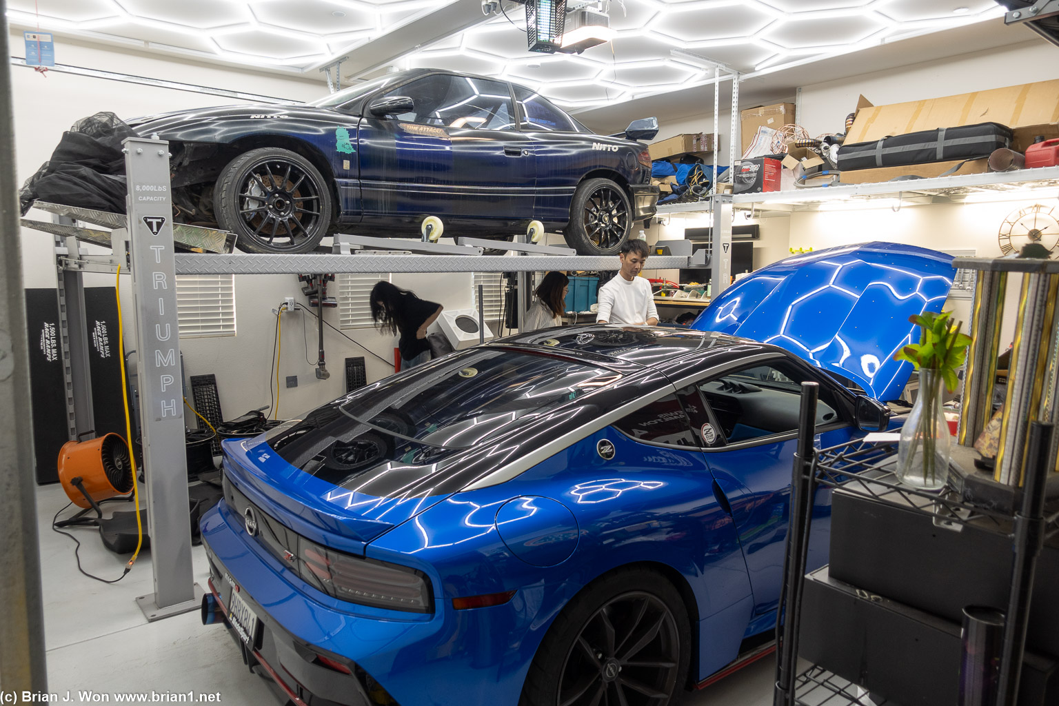 Saturn SC2 race car on the lift.