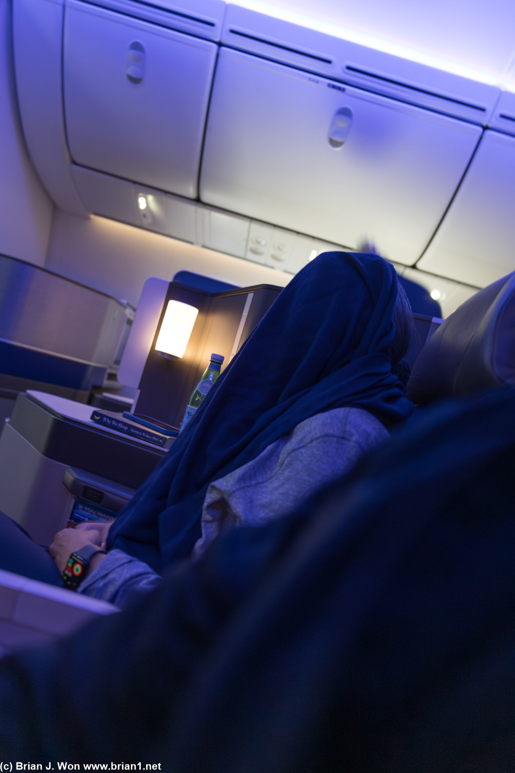 Hiding from her scary movie.